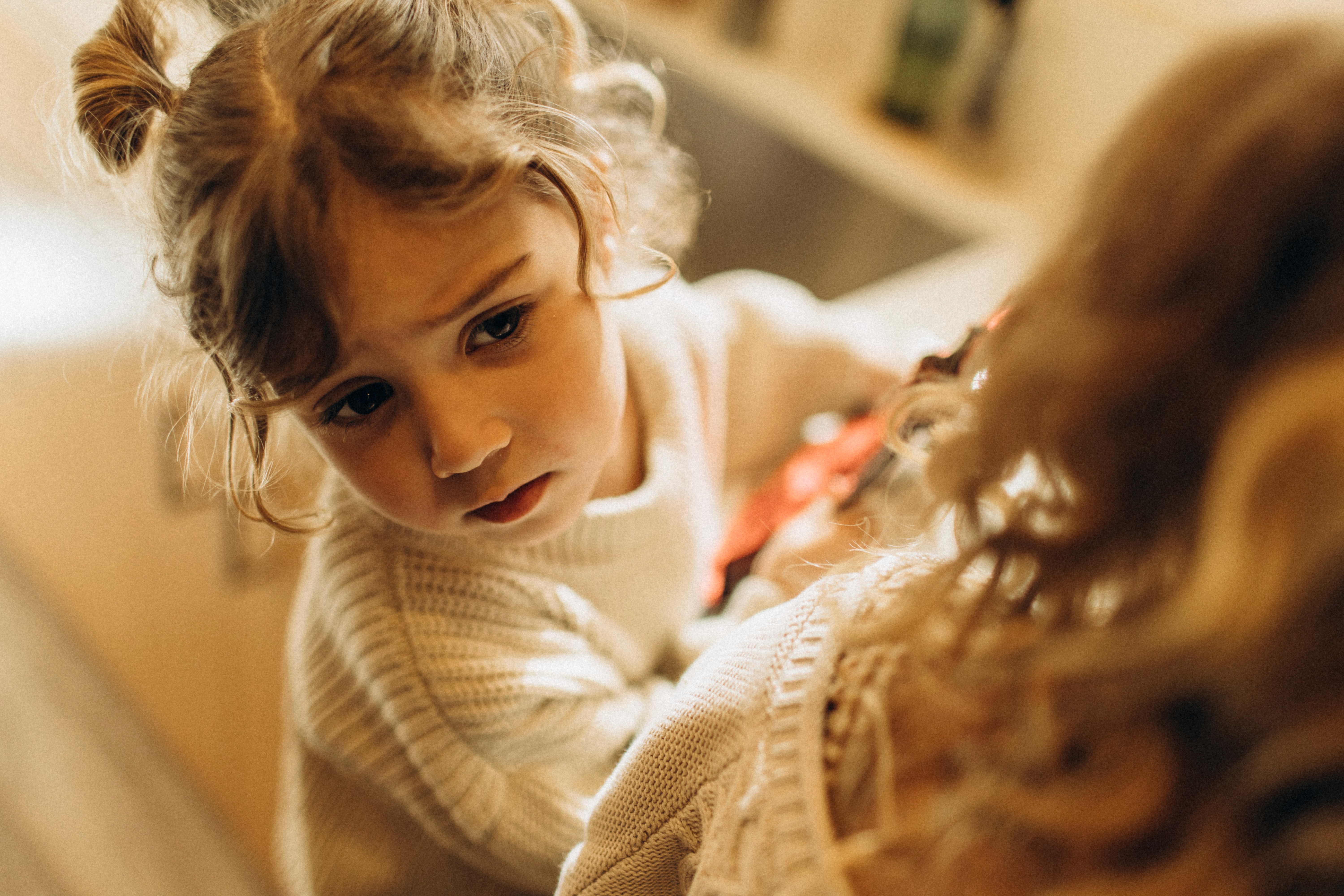 Little girl drinking from a mug