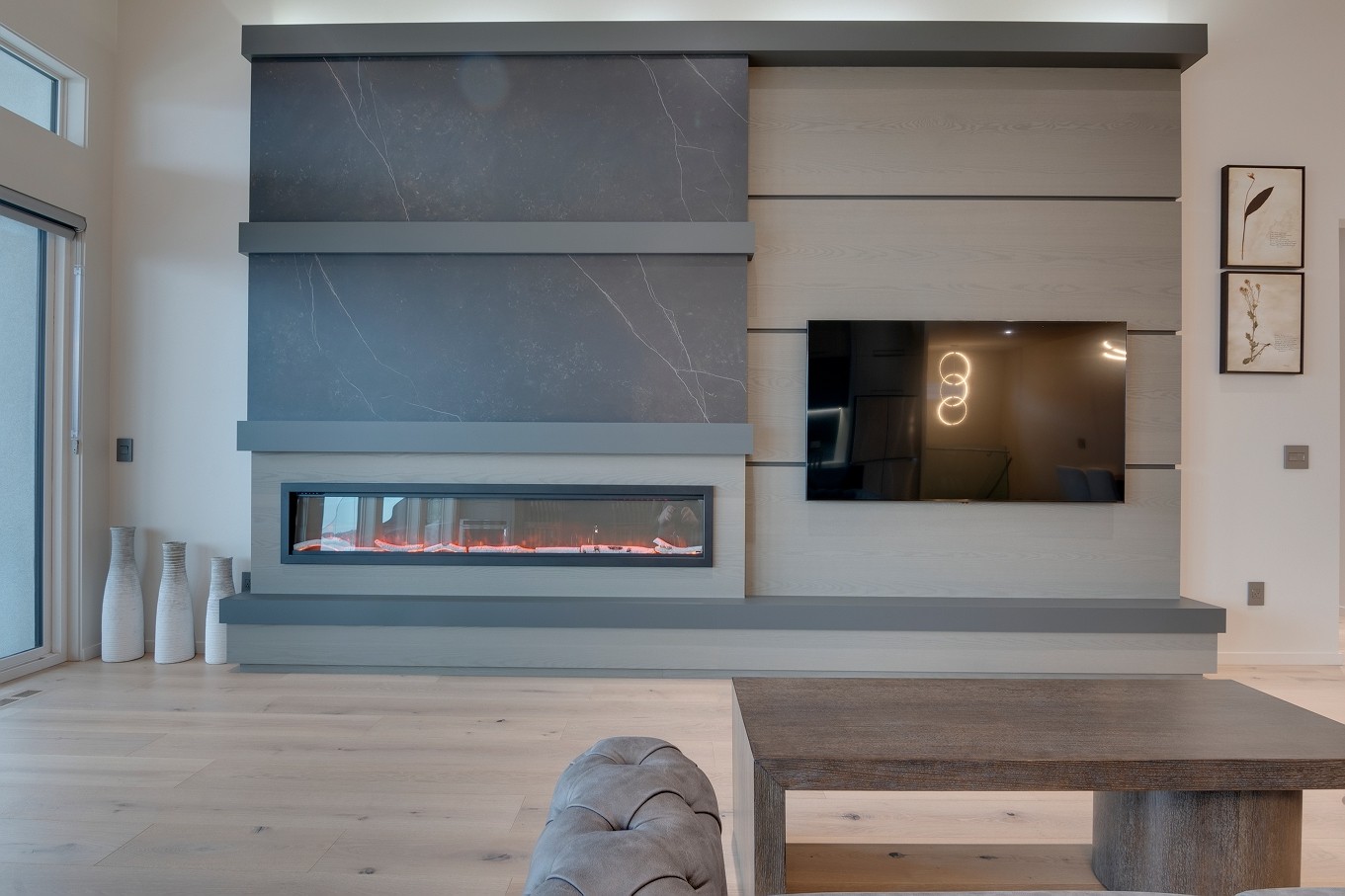 Built-in media wall with fireplace and custom cabinetry