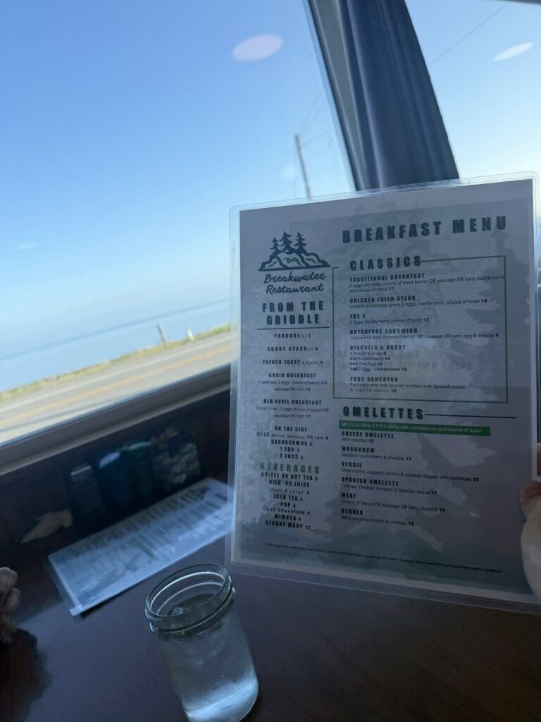 Breakfast menu at The Breakwater in Sekiu, with the strait in the background