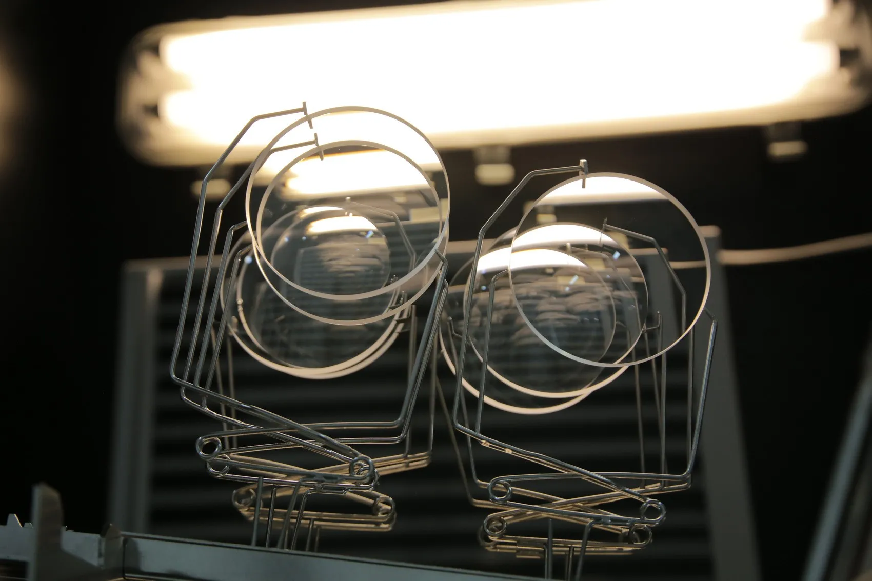 Ophthalmic Lenses hung on rack