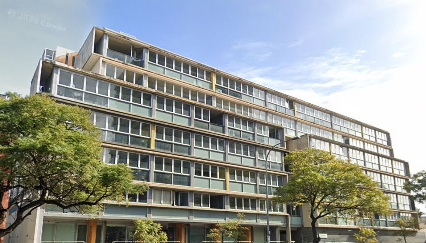 white concrete building under blue sky during daytime