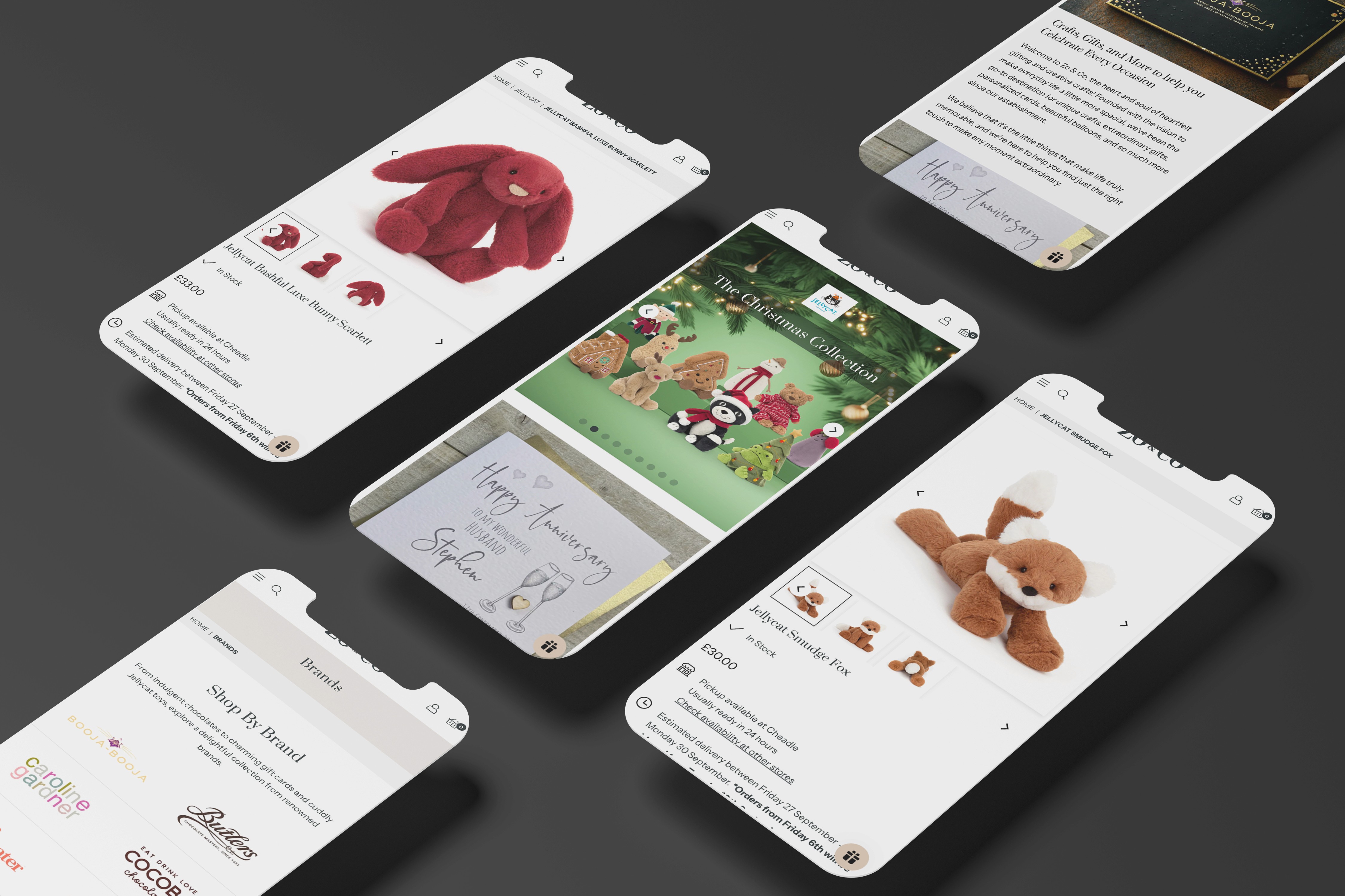 two cell phones on a gray surface