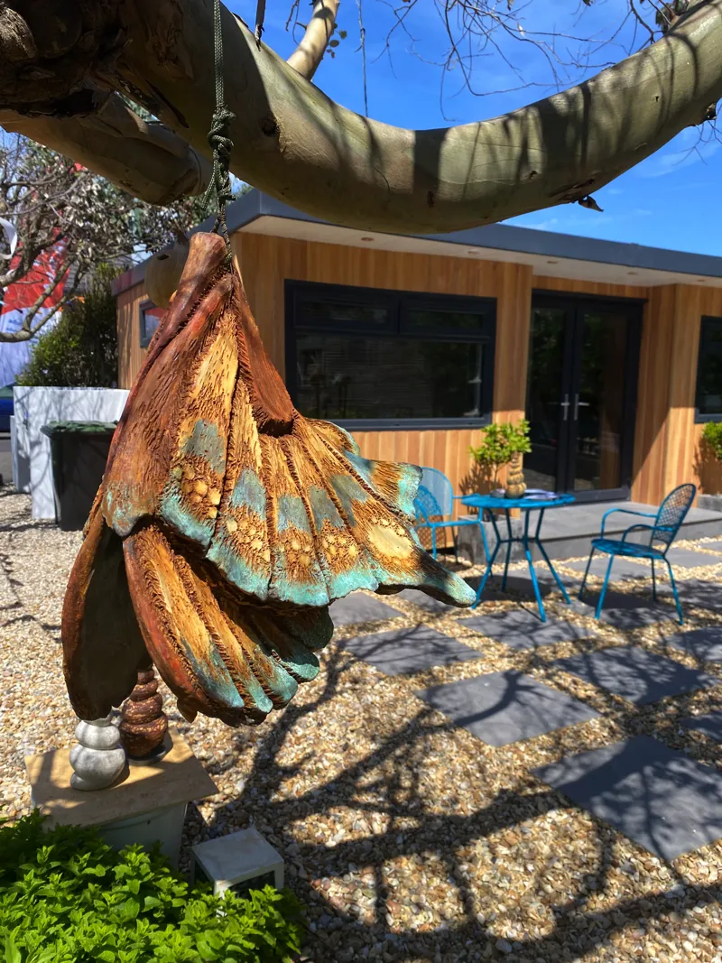 hanging unfurling garden sculpture by abby martin