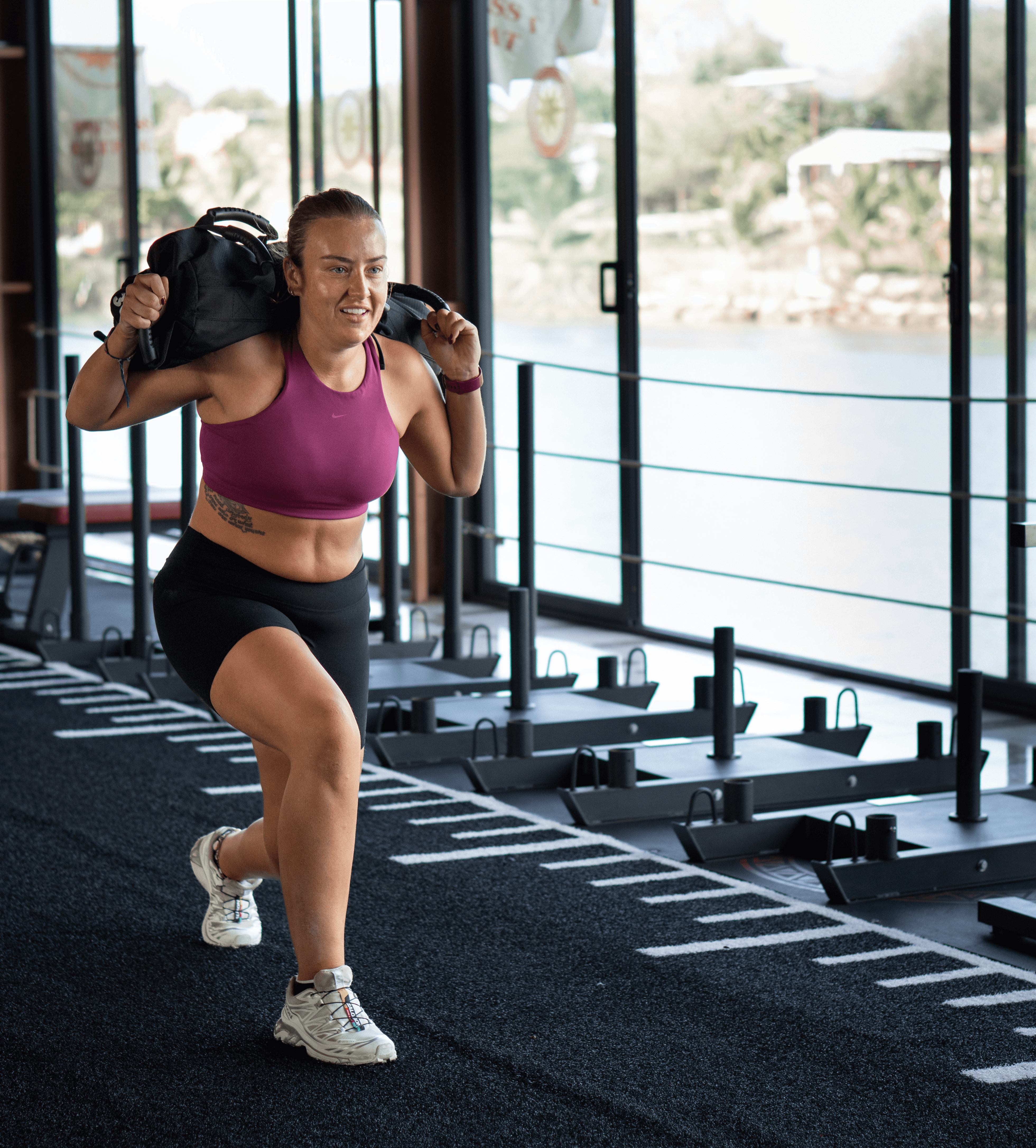 Guest doing sandbag lunges at Nova