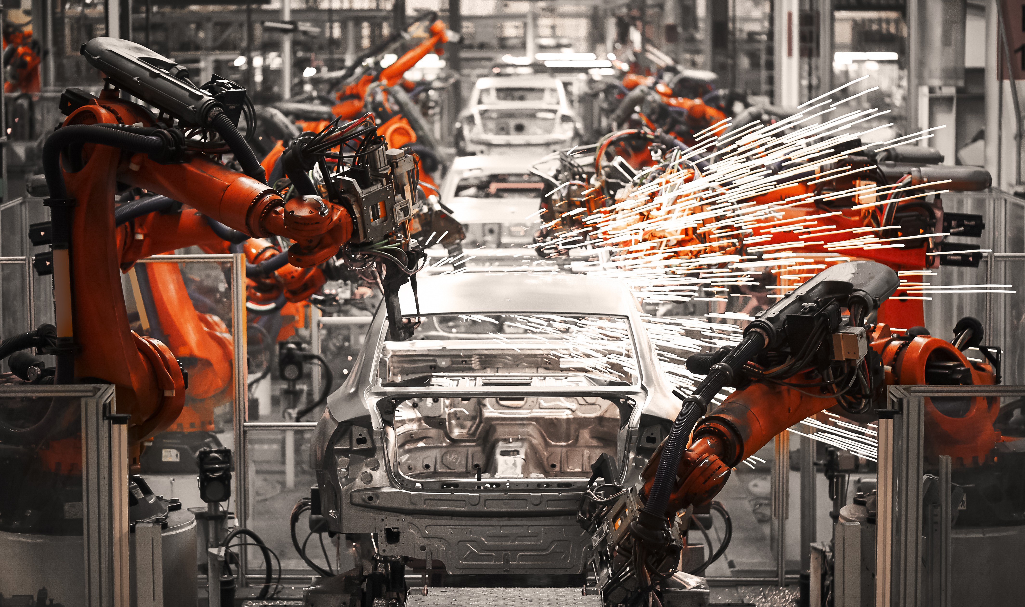 Automotive industry’s assembly line with CNC machines and robot arm by Automech