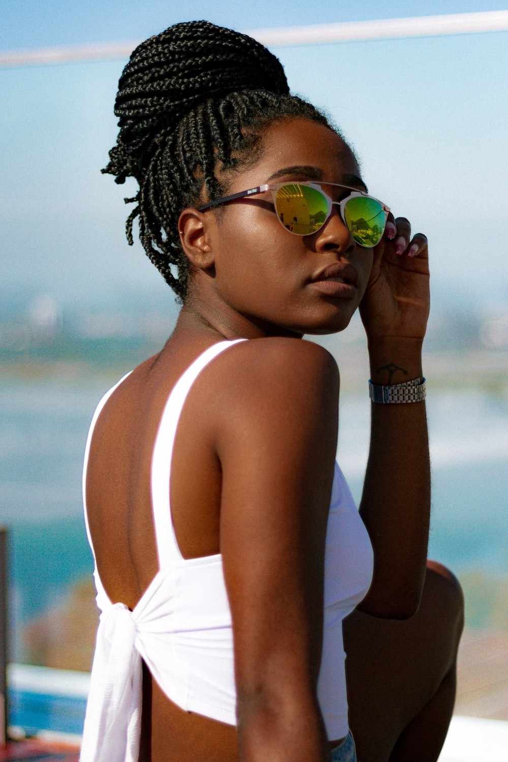 Editorial fashion photography of a woman model wearing a white shirt for Be My Guest brand