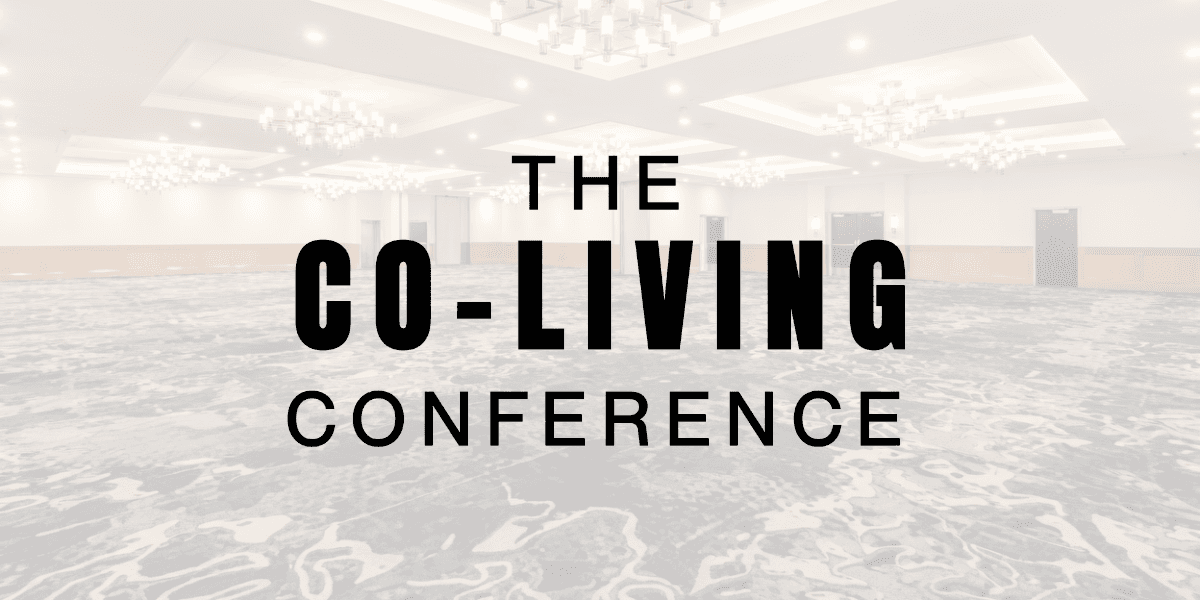 Housing professionals networking at co-living conference, discussing innovative shared living models, affordability solutions, and community-focused real estate development in an urban setting.