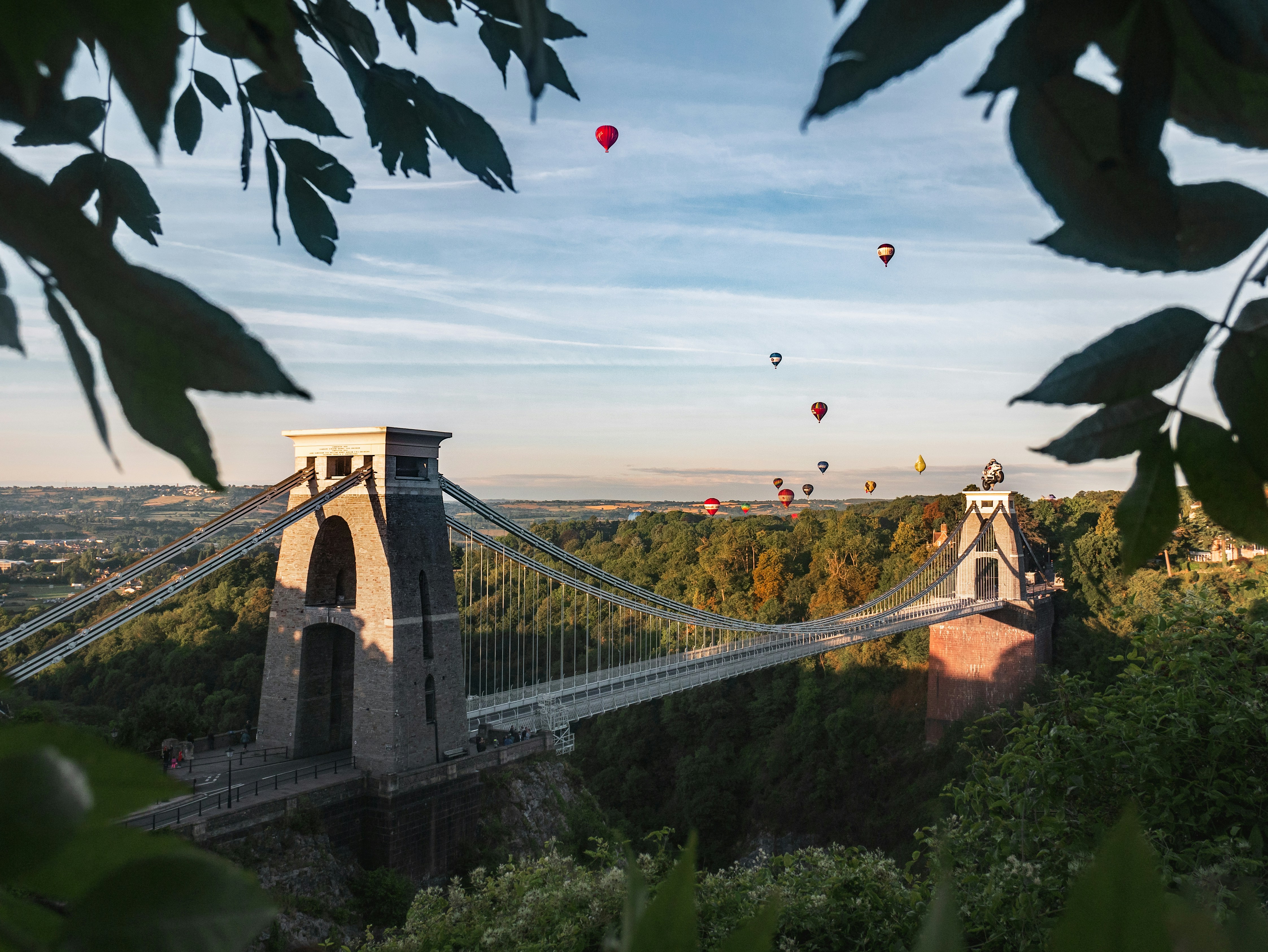 people walking on bridge during daytime