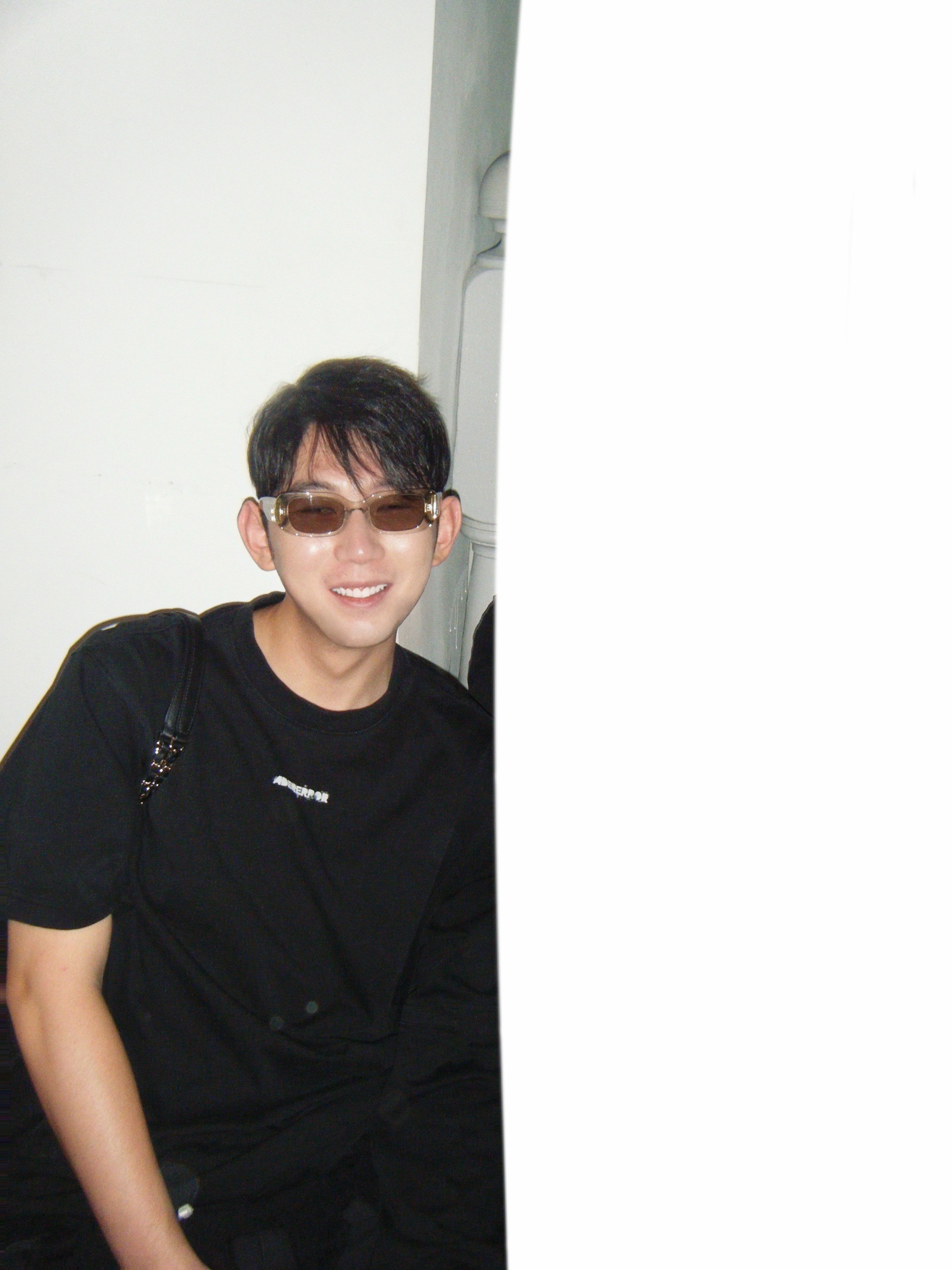 A fashion website interface showcases a minimalist design with an orange header and a "Denim, Redefined" section displaying images of models wearing casual clothing, emphasizing a modern and stylish selection of jeans for men and women.