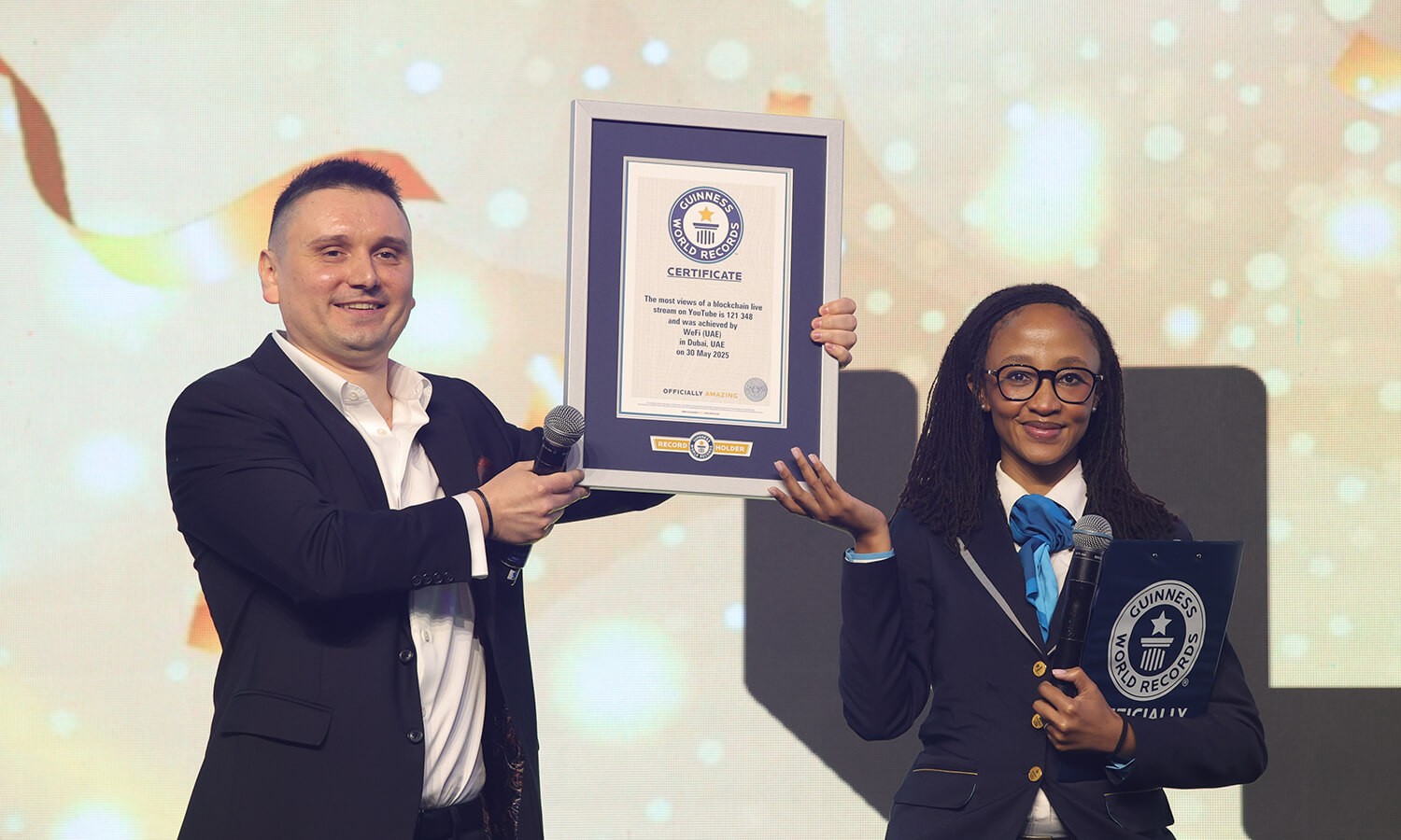 Maksym Sakharov accepting the Guinness World Record Logo