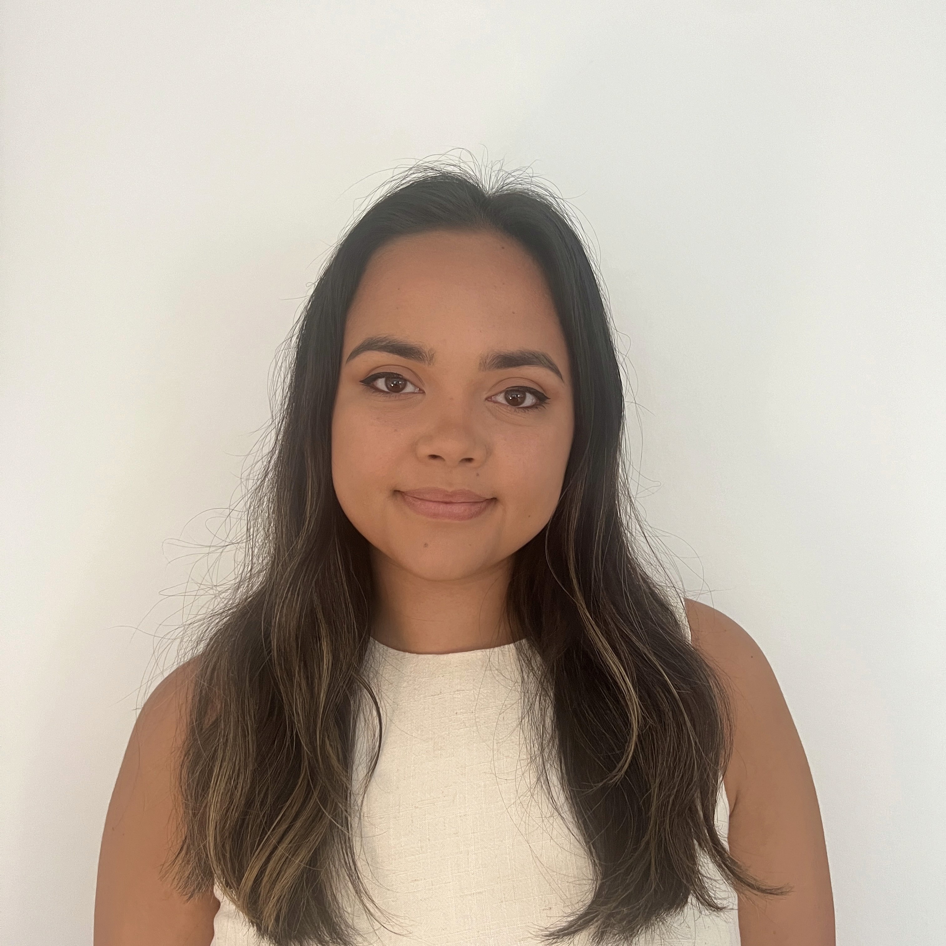 A photo of a man wearing a cap looking above