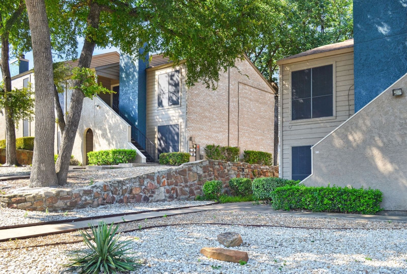 Druid Townhomes — 7-unit multifamily community in Dallas, TX; managed by Savoy Residential.