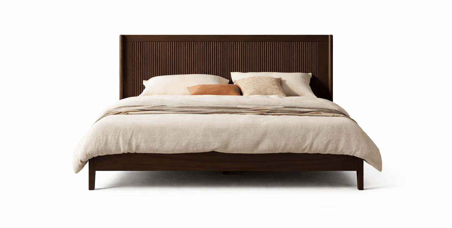 Minimal bed frame with broad mattress support, soft upholstery, and grounded stance