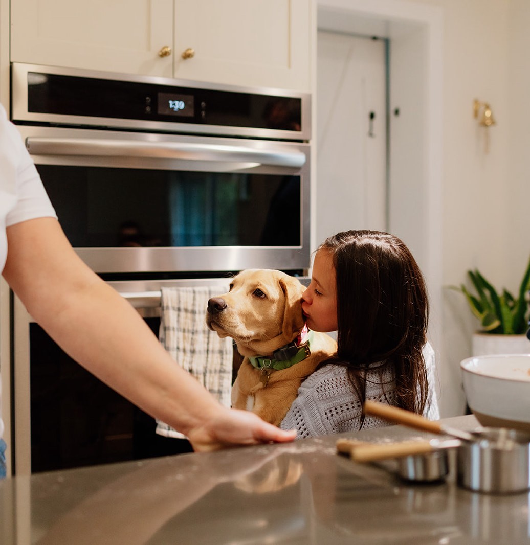 Woman by the sea with waves splashing