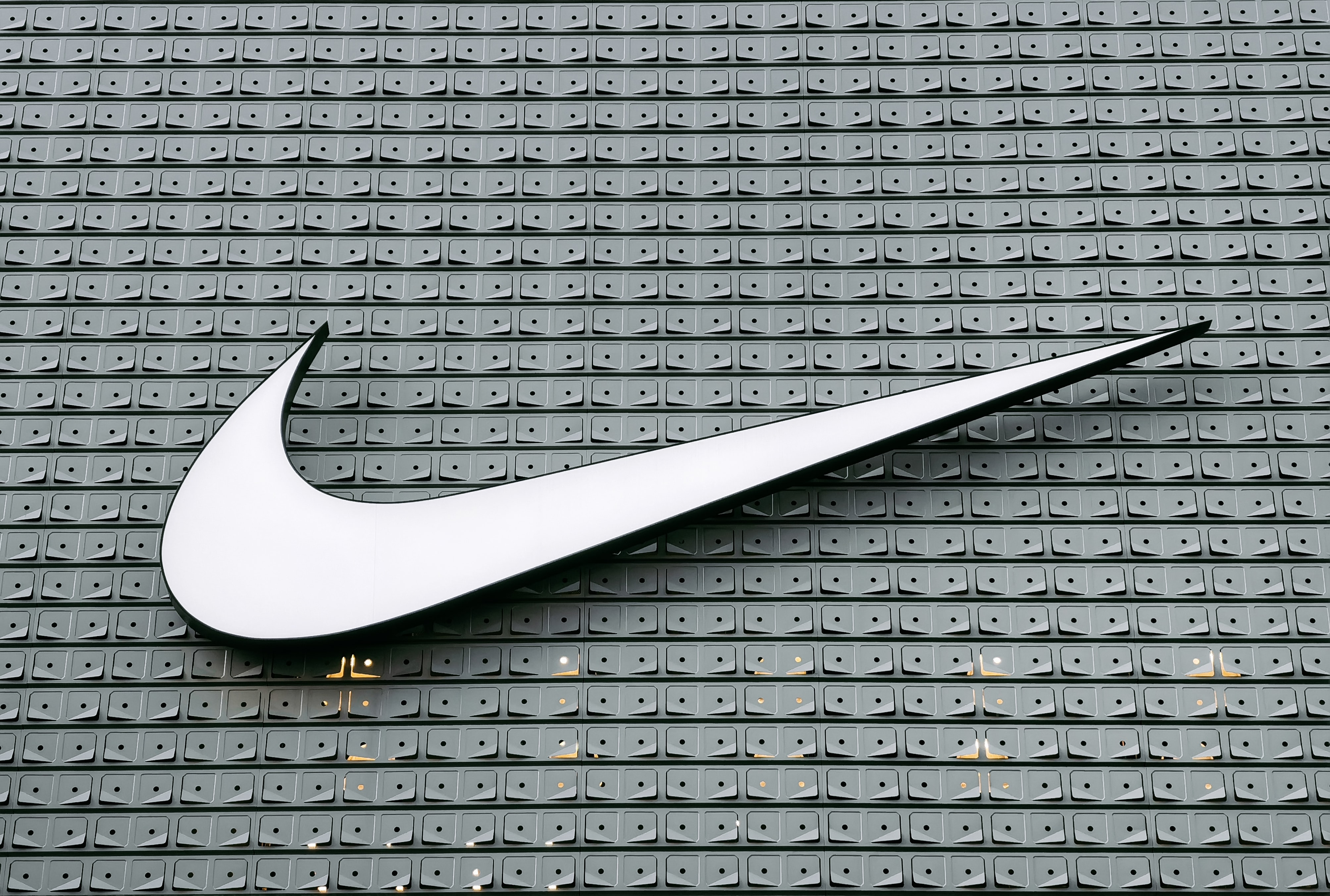 Black and white concrete building with Nike logo