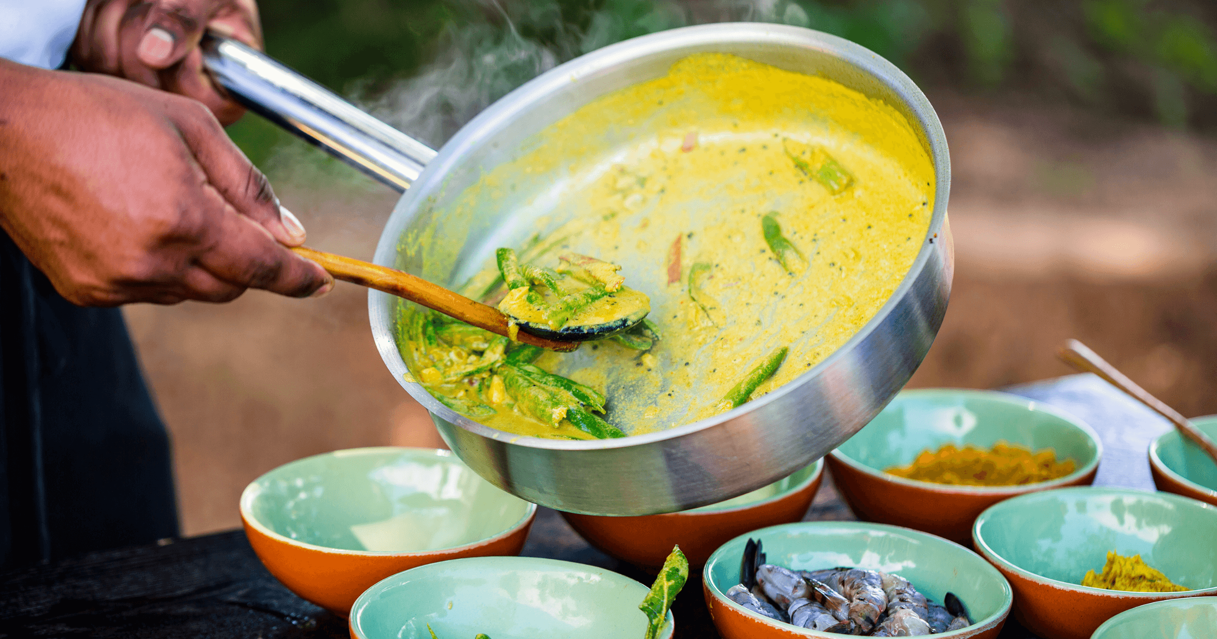 A Malaysian business owner cooking