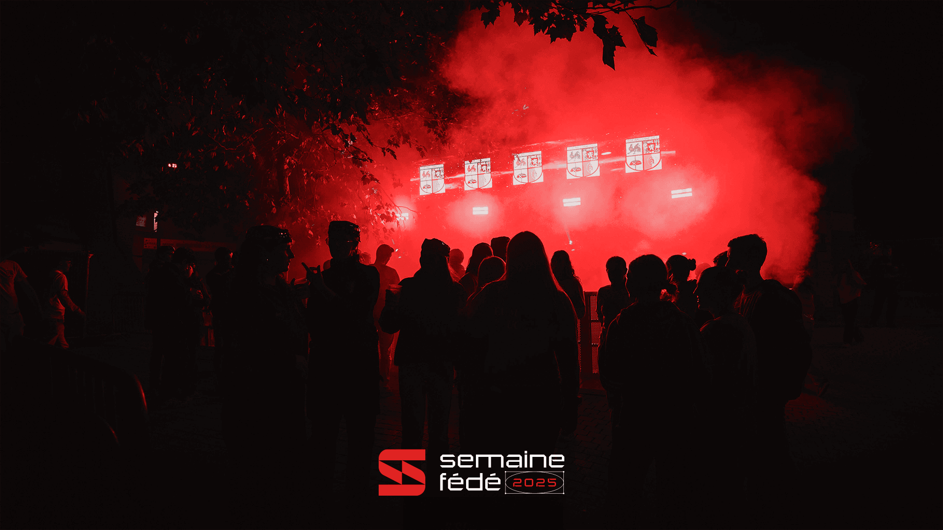 A night-event scene with a crowd silhouetted against intense red lights and smoke, featuring your Semaine Fédé 2025 logo placed cleanly at the bottom.