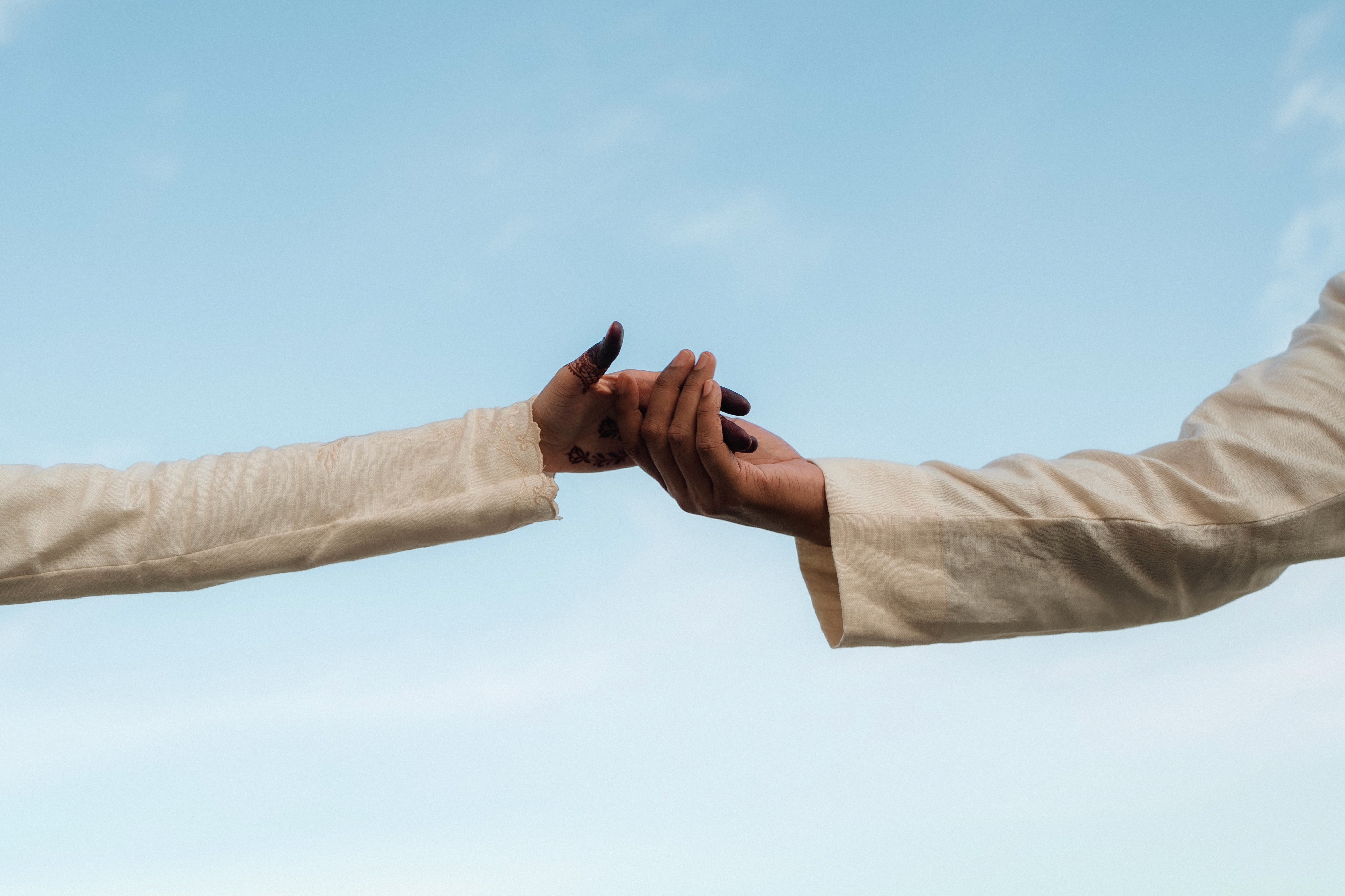Groom holding the hand of a bride in Singapore.