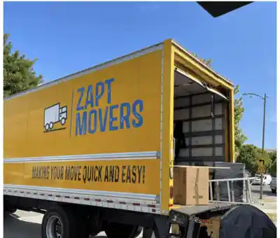 Zapt Movers yellow truck representing over 15000 completed moves
