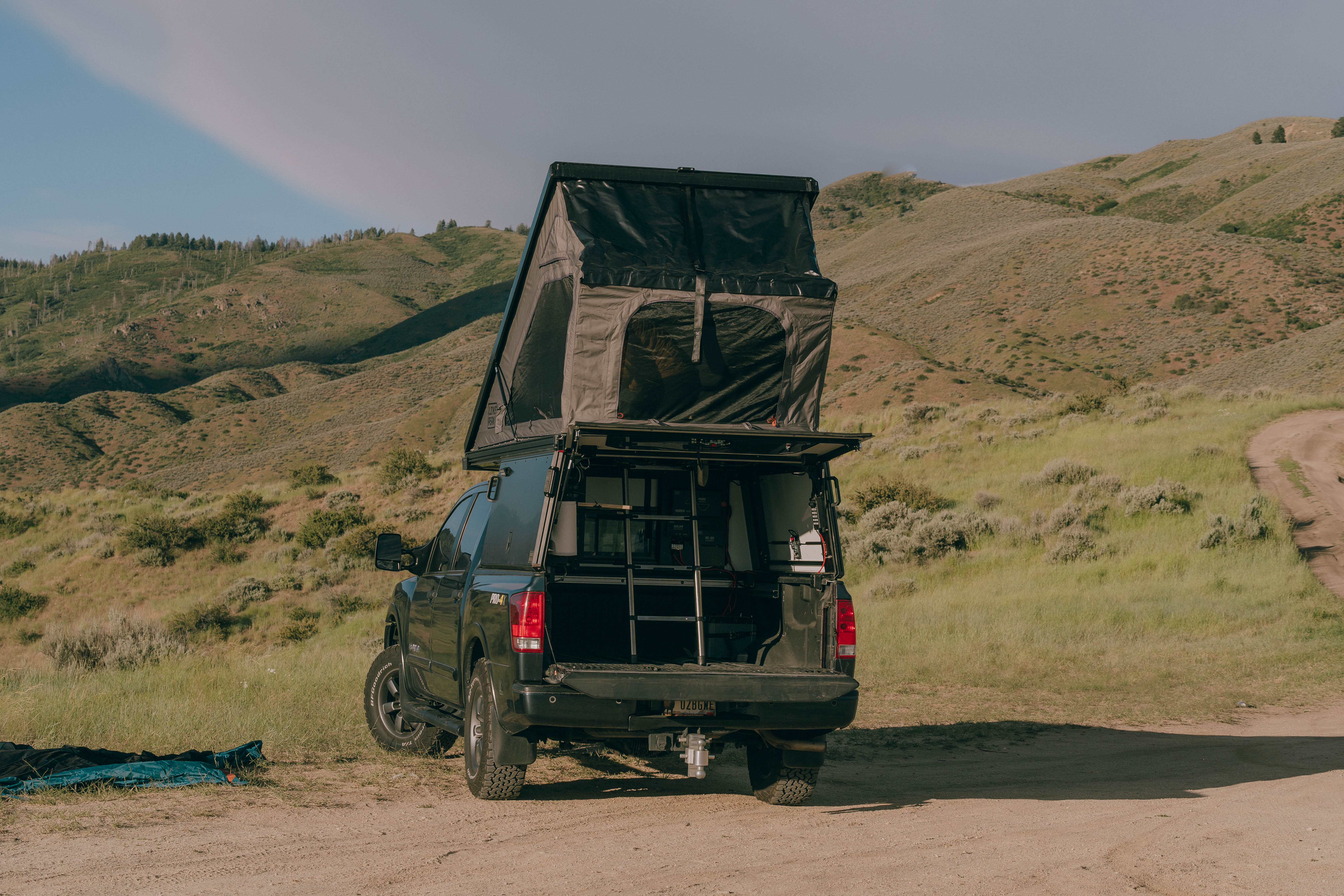 Artistic portrait with red and blue lighting creating a dramatic effect
