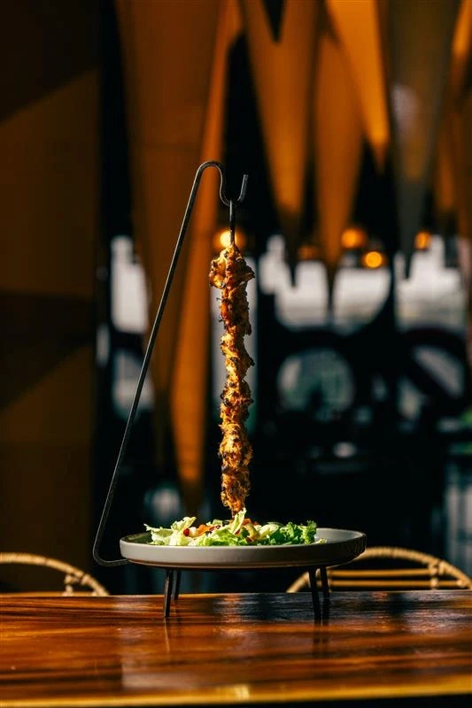 Grilled skewer dish served on a plate at Red Rhino restaurant