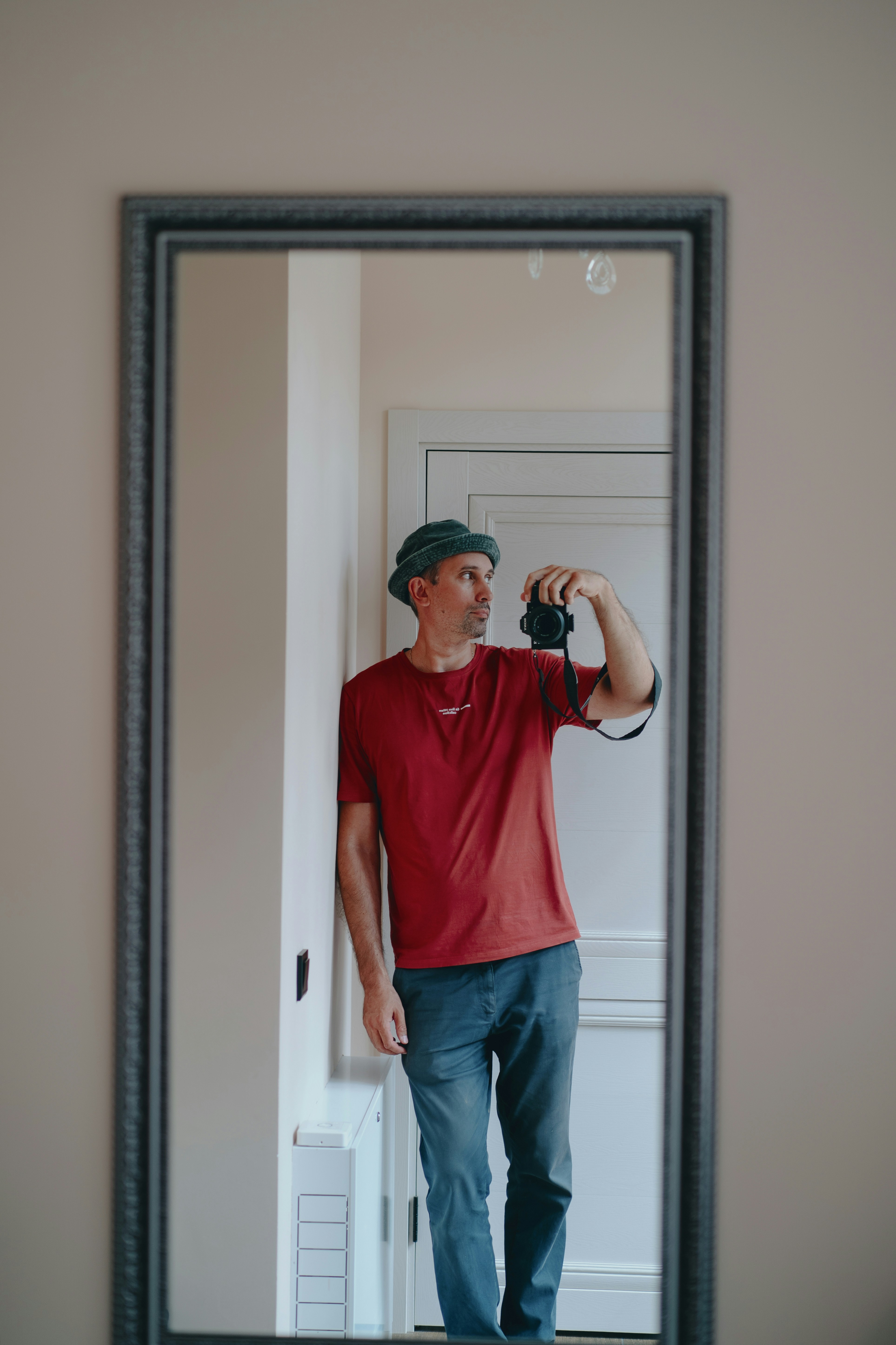 A man taking a picture of himself in a mirror