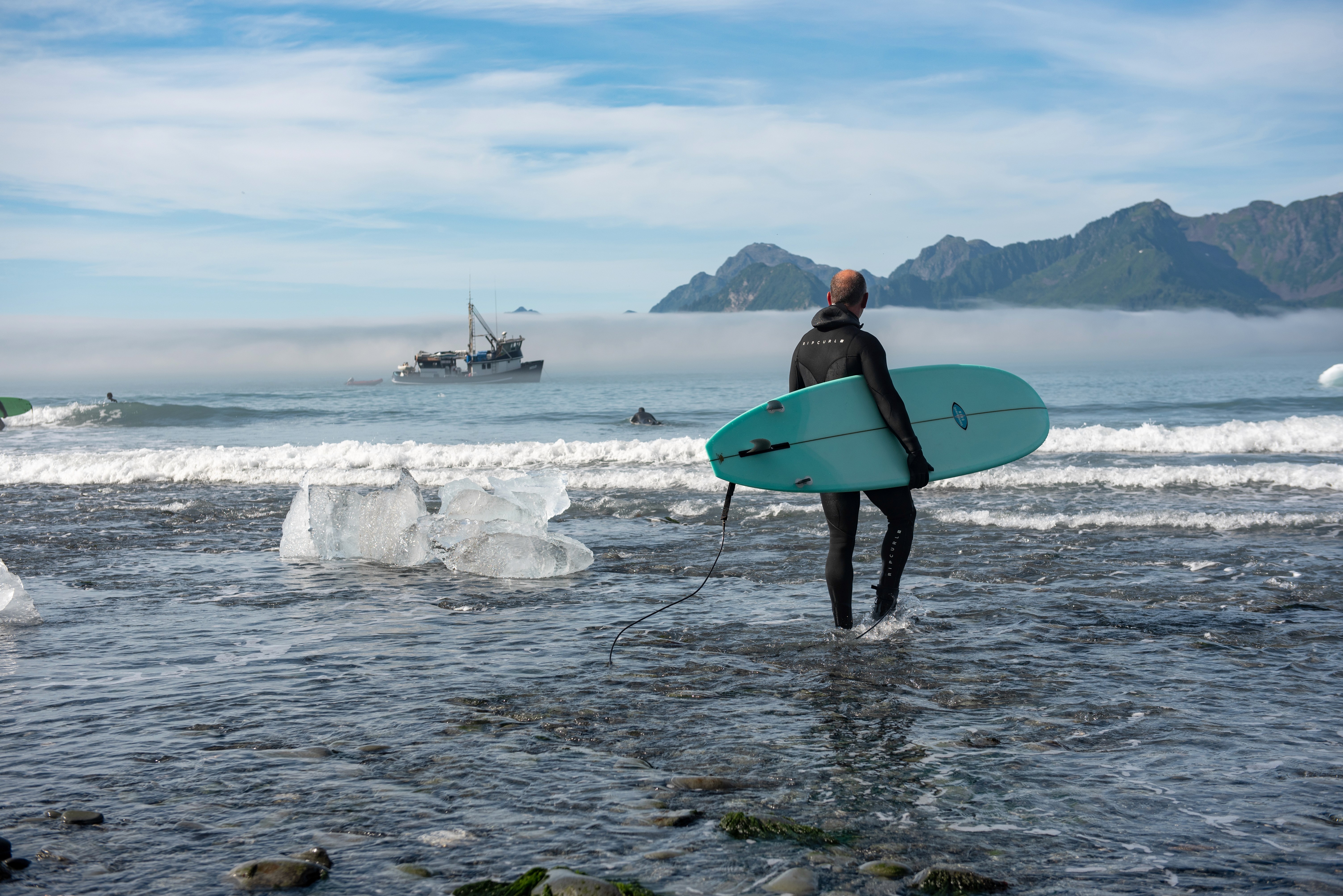 Girl pose while wear orange coat & paint