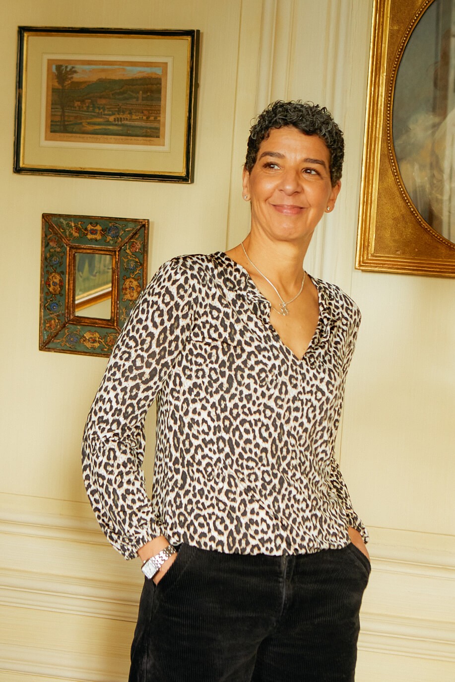 Yas with hands in pockets