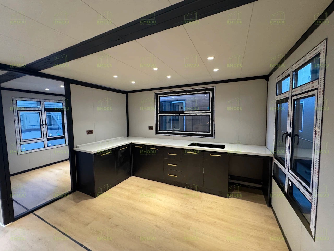 Expanded house showing living room, bedroom, and bathroom.