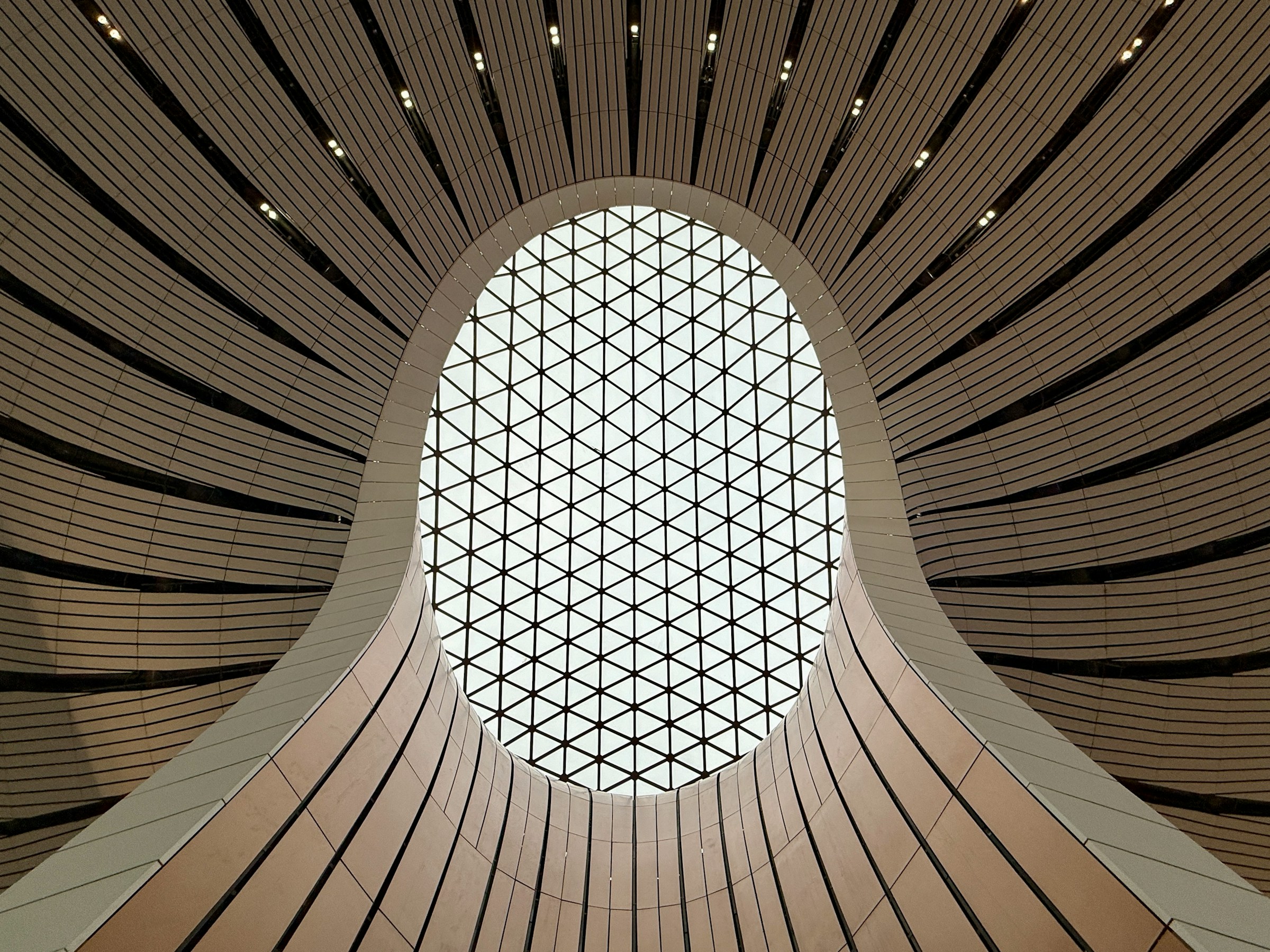 Modern architectural ceiling with oval skylight