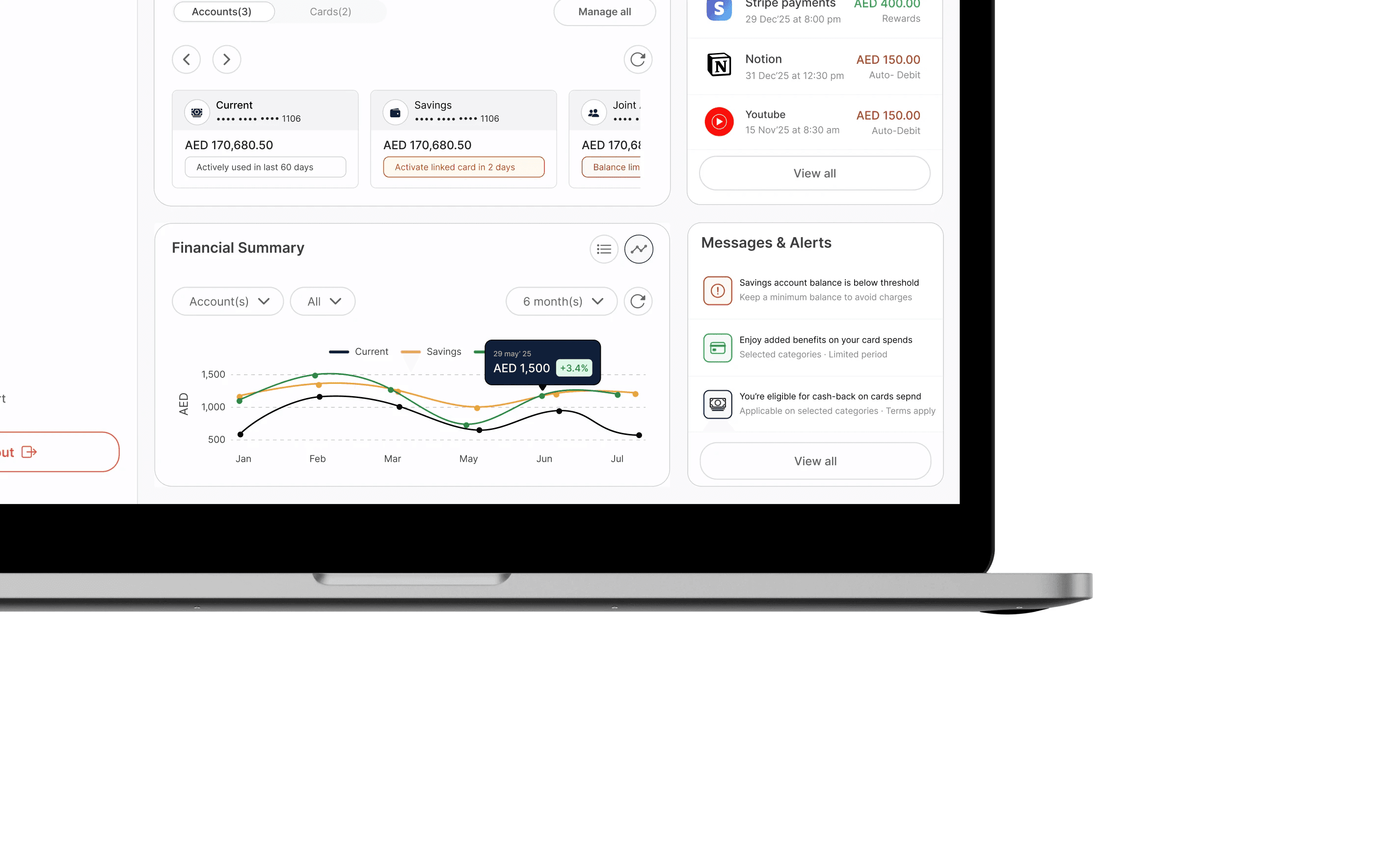 Hand flipping through a book on table beside a cup.