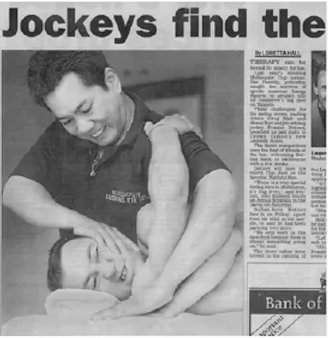 Newspaper image of Longy Nguyen treating Jim Cassidy