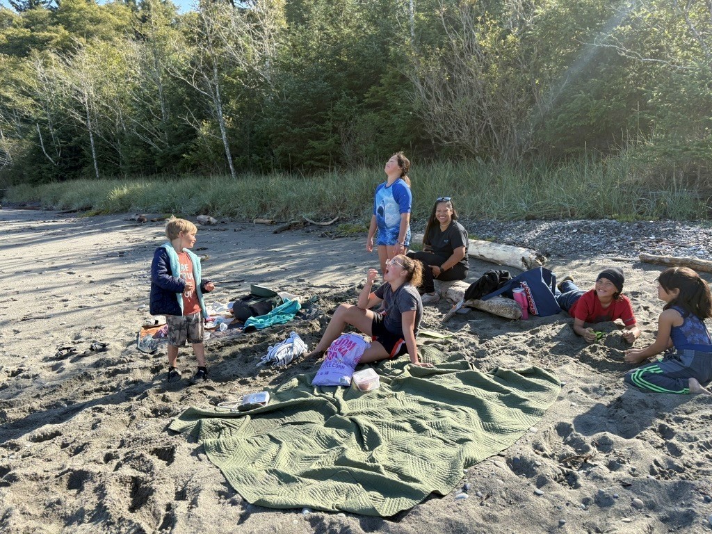 Family and friends together on a Pacific Northwest beach