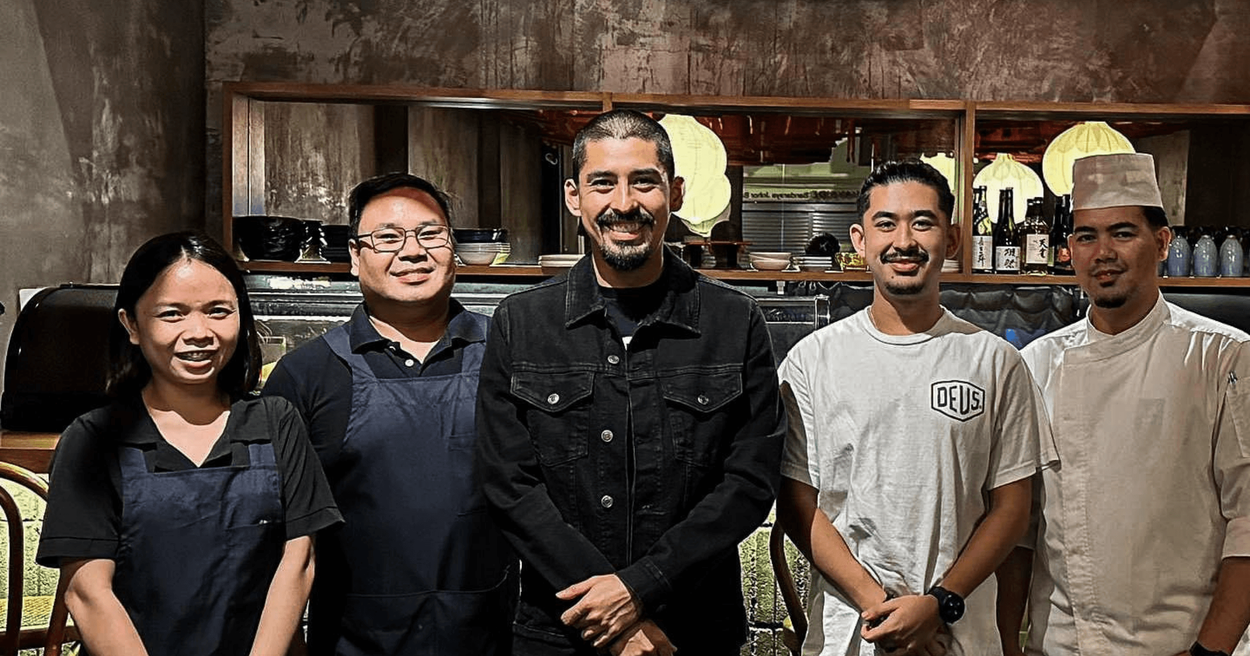 Kyudon staff posing with the Prince of Johor.