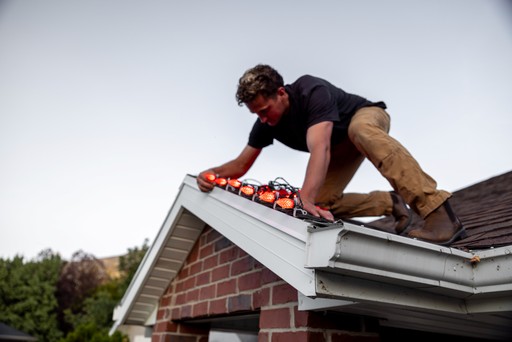 Installing outdoor holiday lighting in Northern Utah