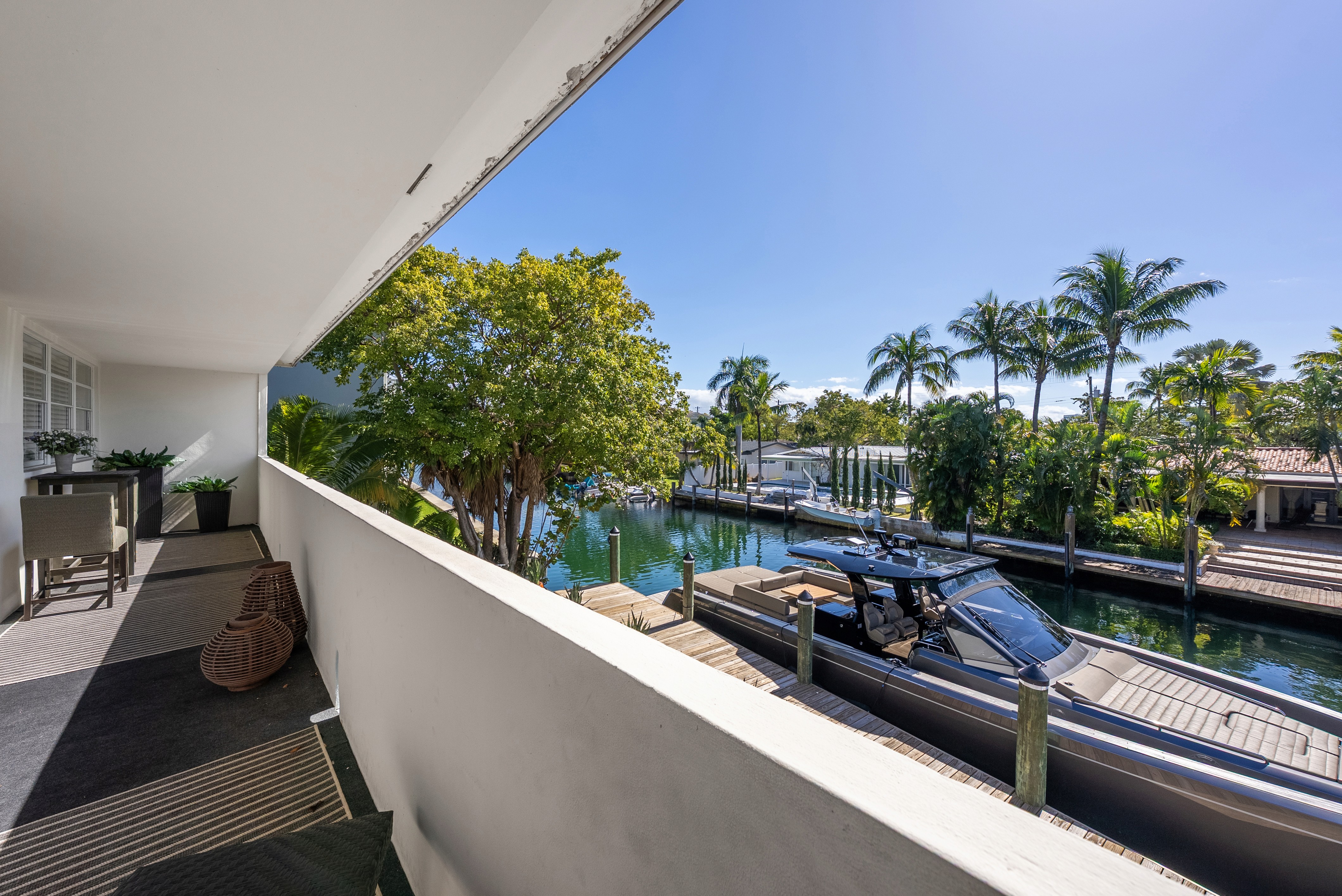 flat lay shot of spa amenities by the bathtub