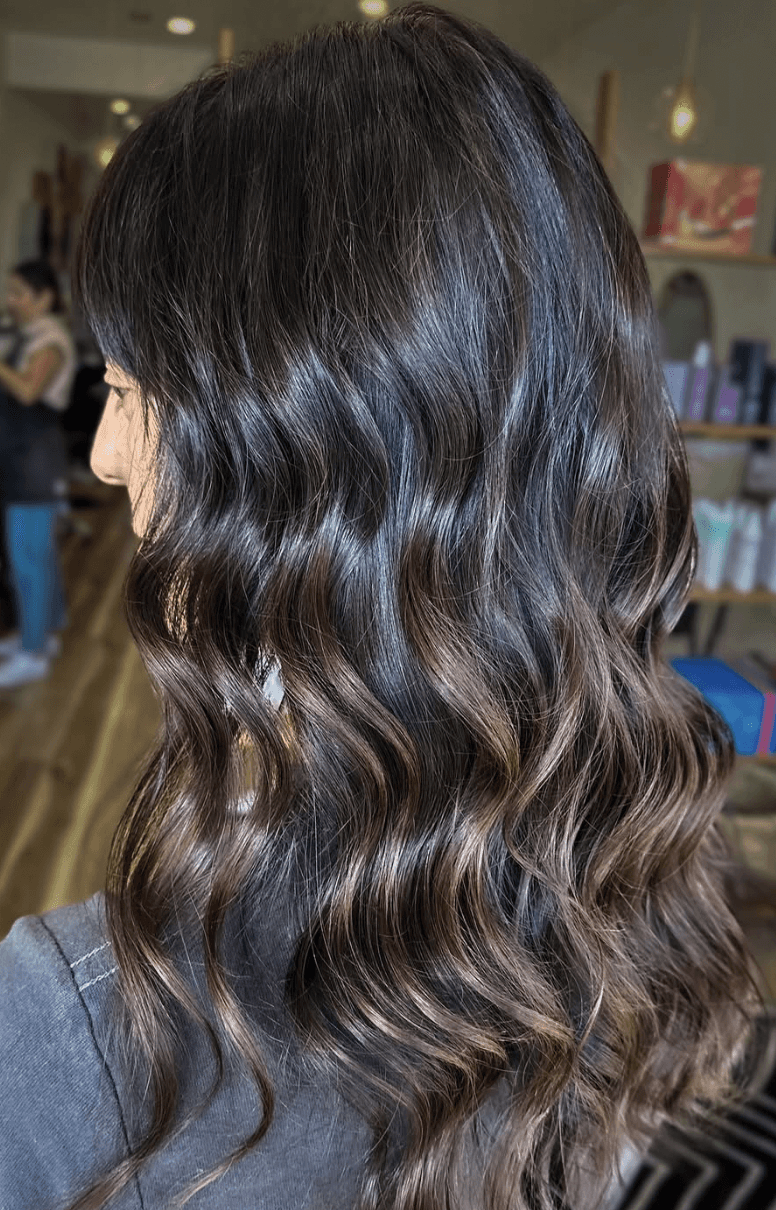 Dimensional mocha brunette color by Marlie Allen at Del Sol Hair Studio Huntington Beach