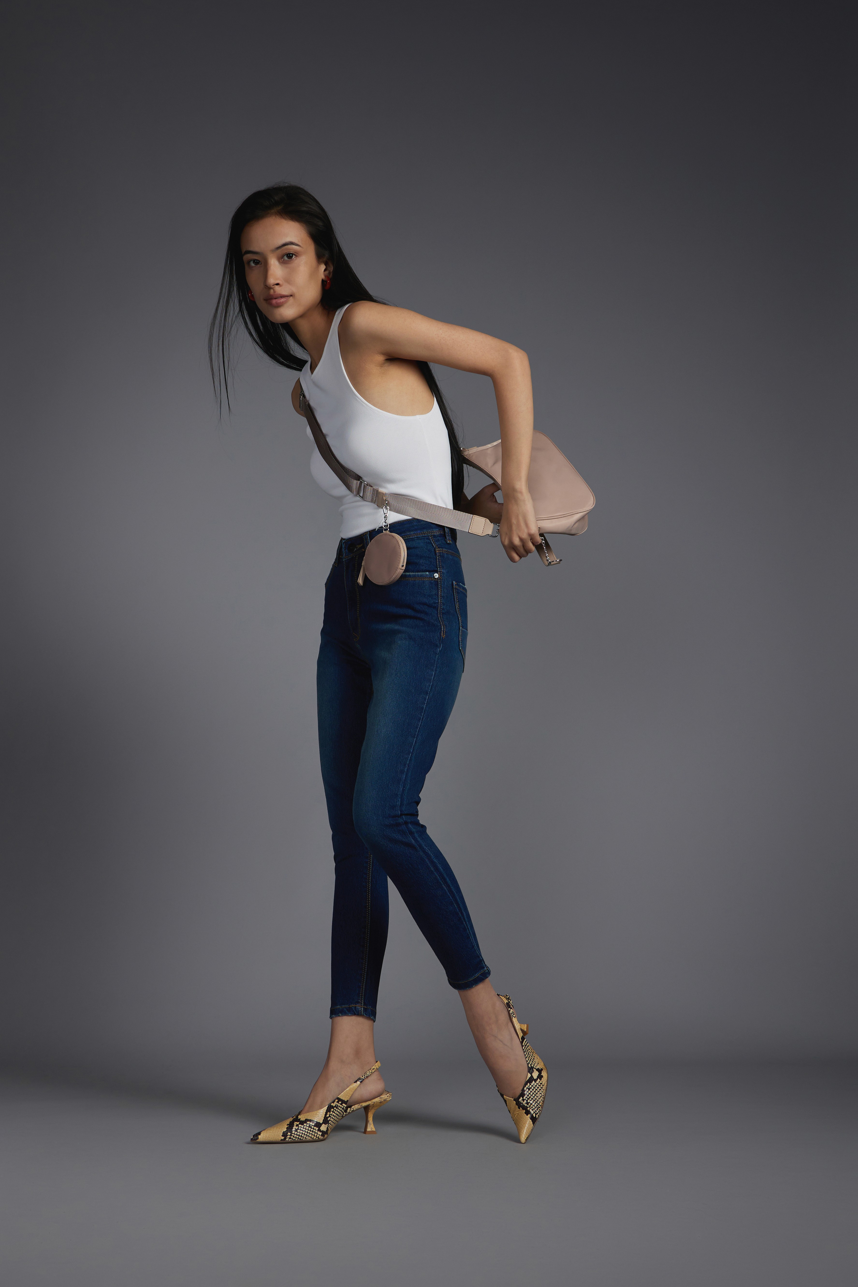 Friends laughing and posing inside a car