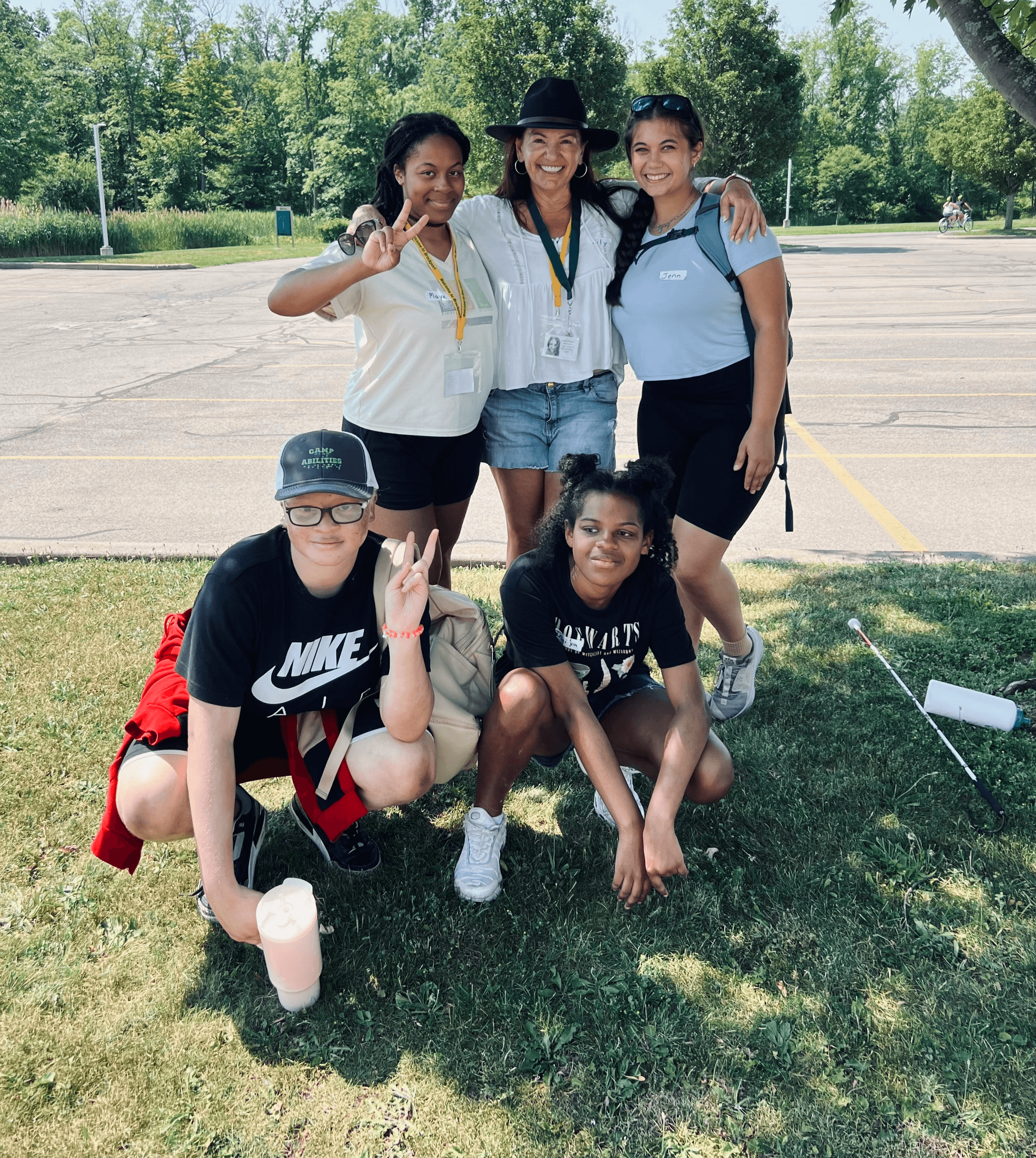 Lily together with teenagers from camp abilities