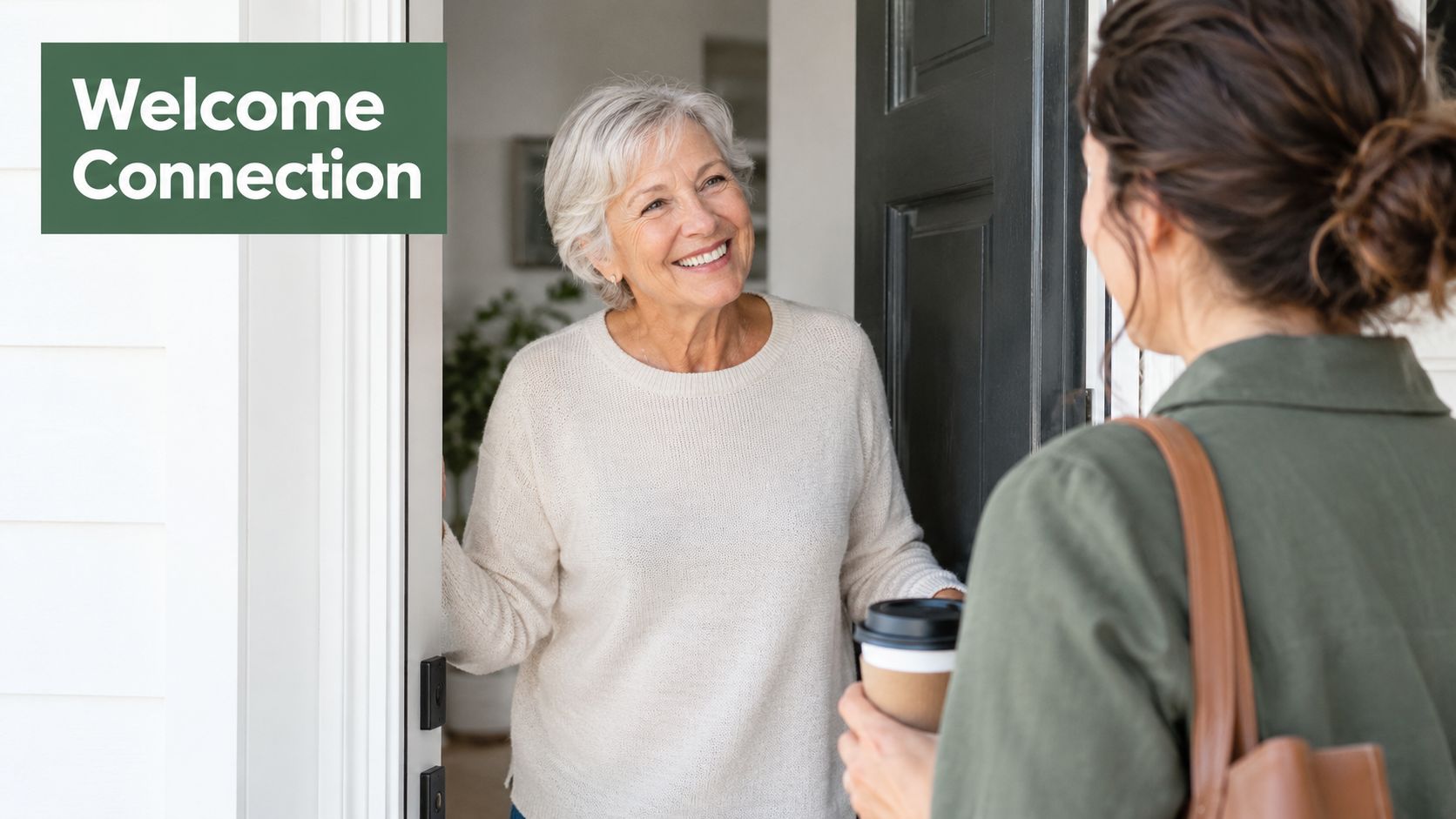A smiling senior woman opens her front door to welcome a younger friend for a friendly visit.