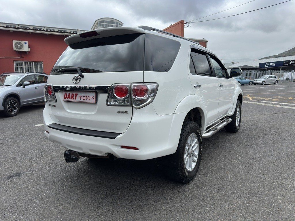 man in white crew neck shirt wearing black framed eyeglasses