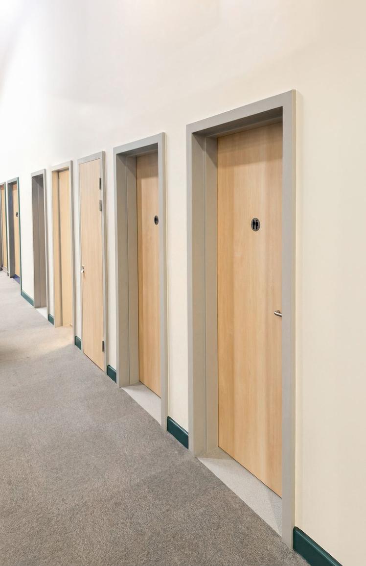 A row of single fire rated doorset used in a college