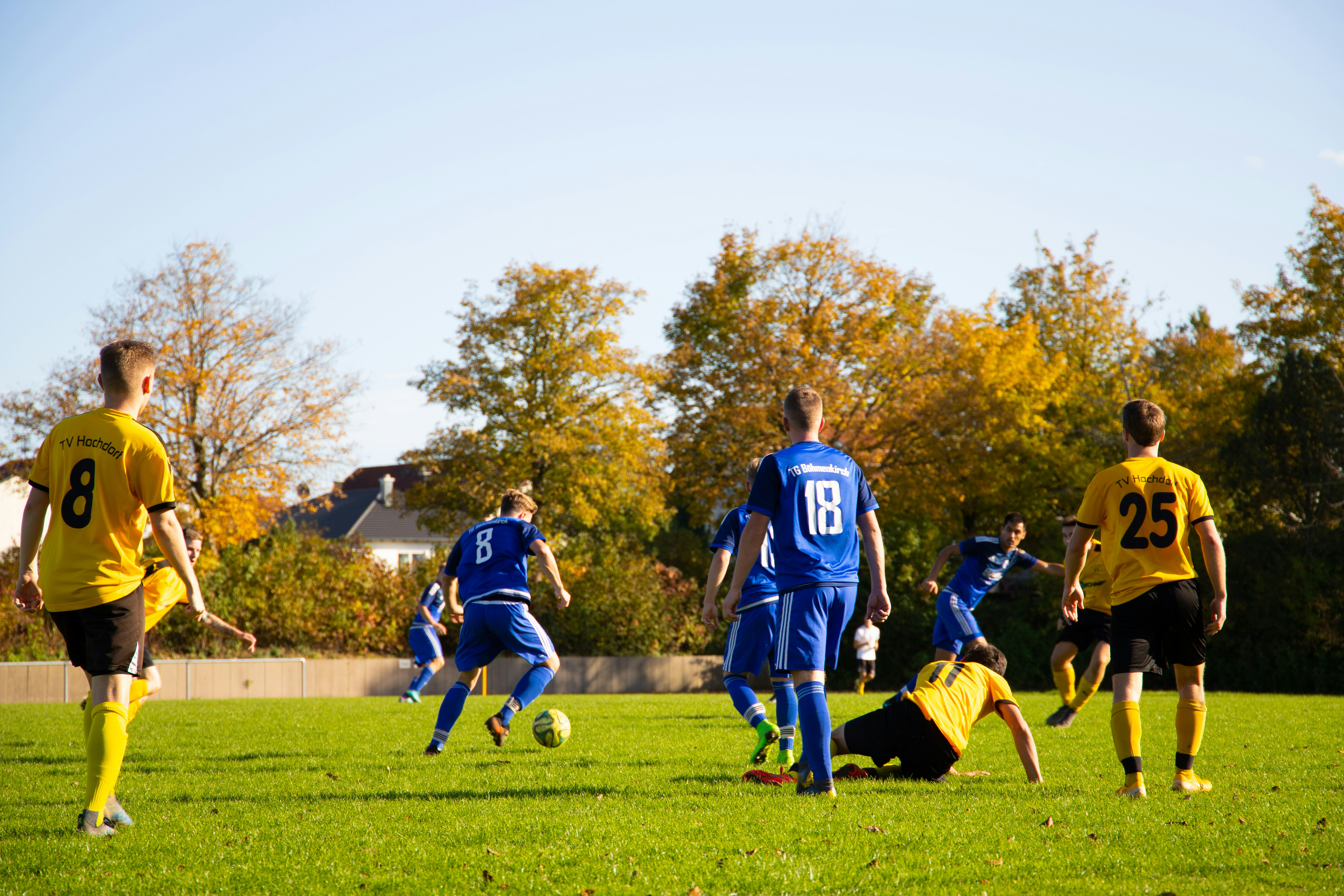 a group of young boys playing a game of soccer