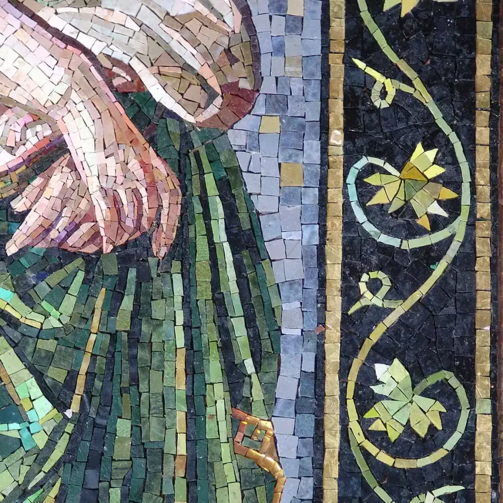 Religious mosaic of Mary Magdalene with biblical inscription, detailed tile work.