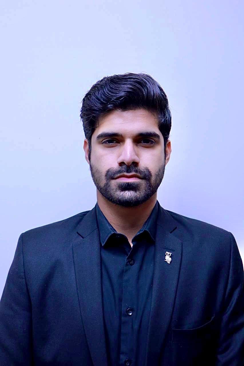Marketing strategist working at a laptop