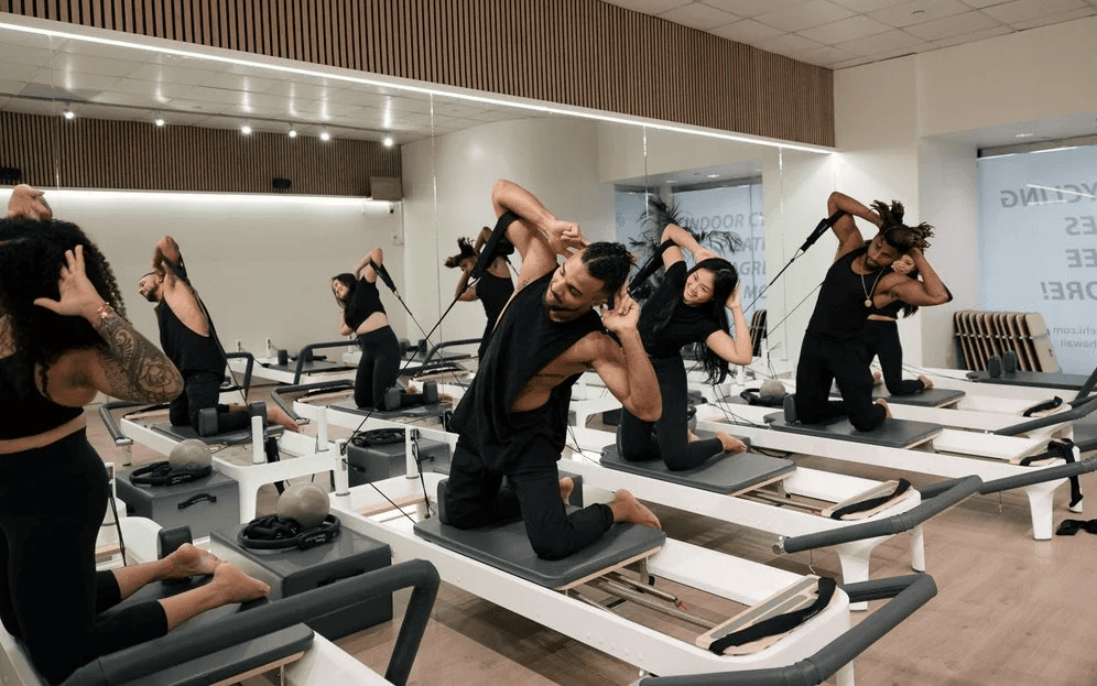 Group reformer Pilates class at Body Balance Hawaiʻi