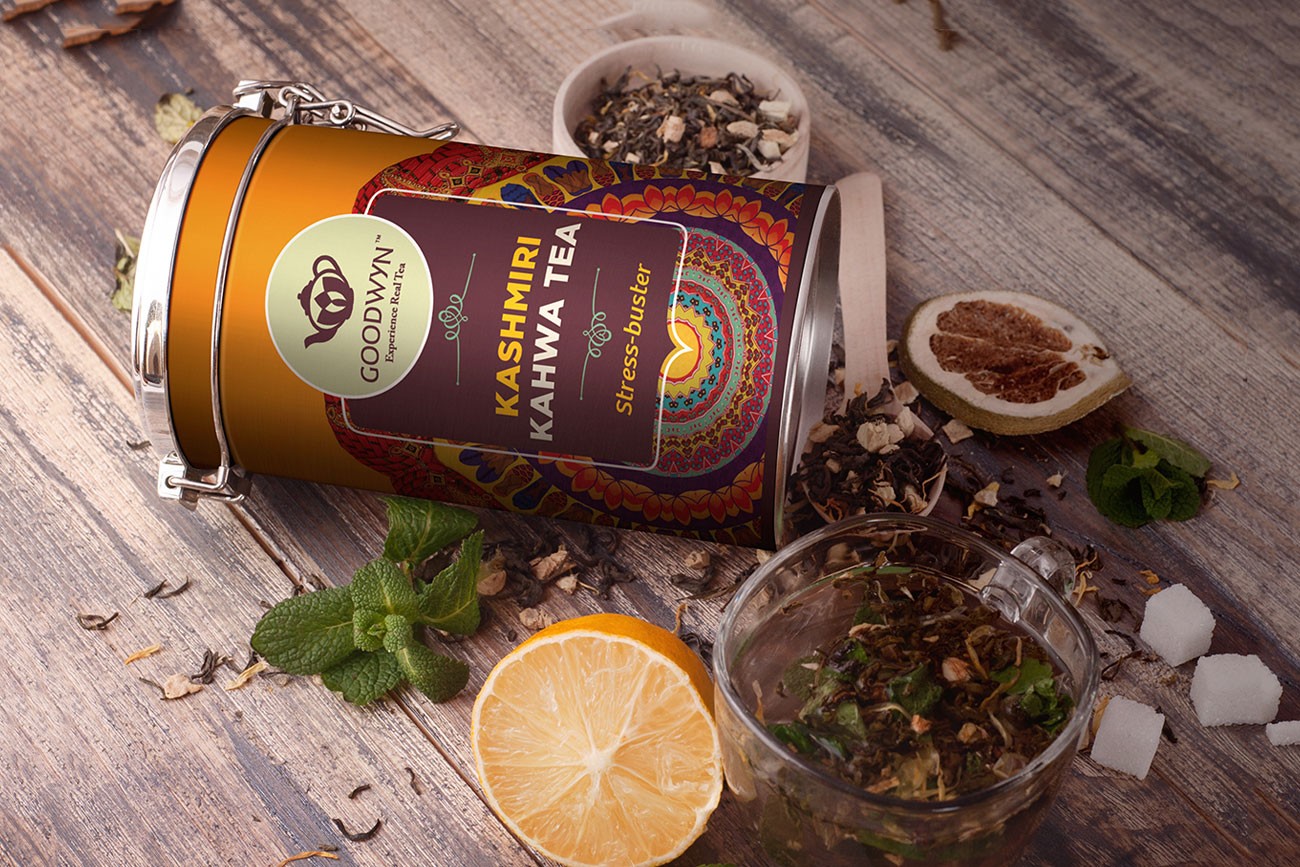 A person stands in a sandstone cave.
