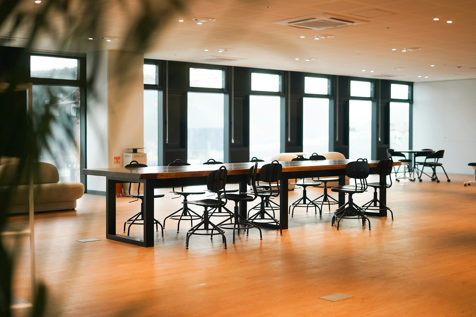 Flexible coworking office with shared desks and meeting space