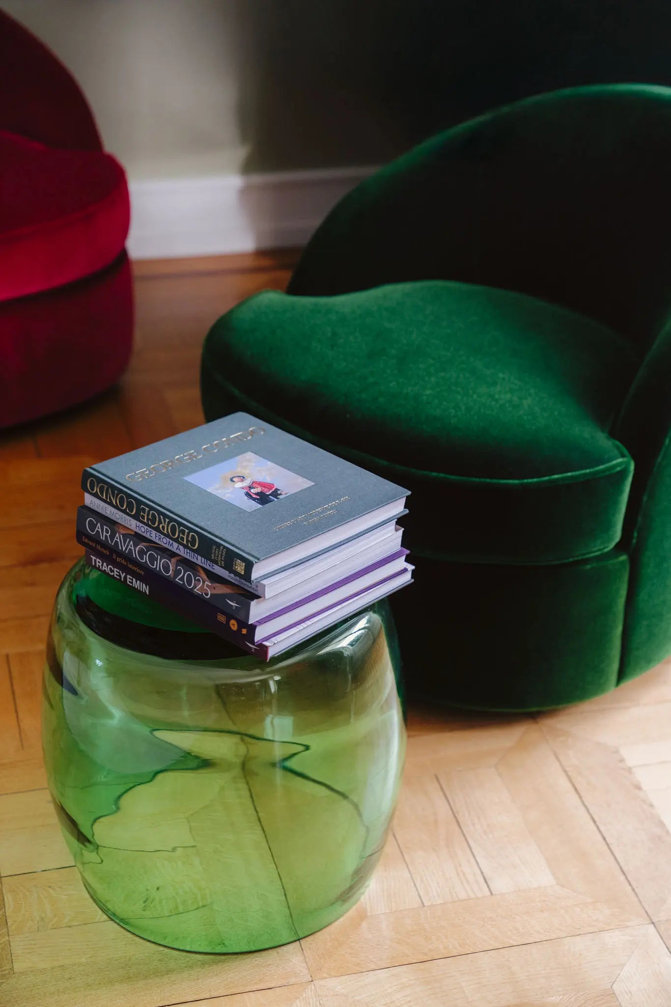 Green Tavolini Murano glass work functioning as a sculptural side table in a contemporary living space.