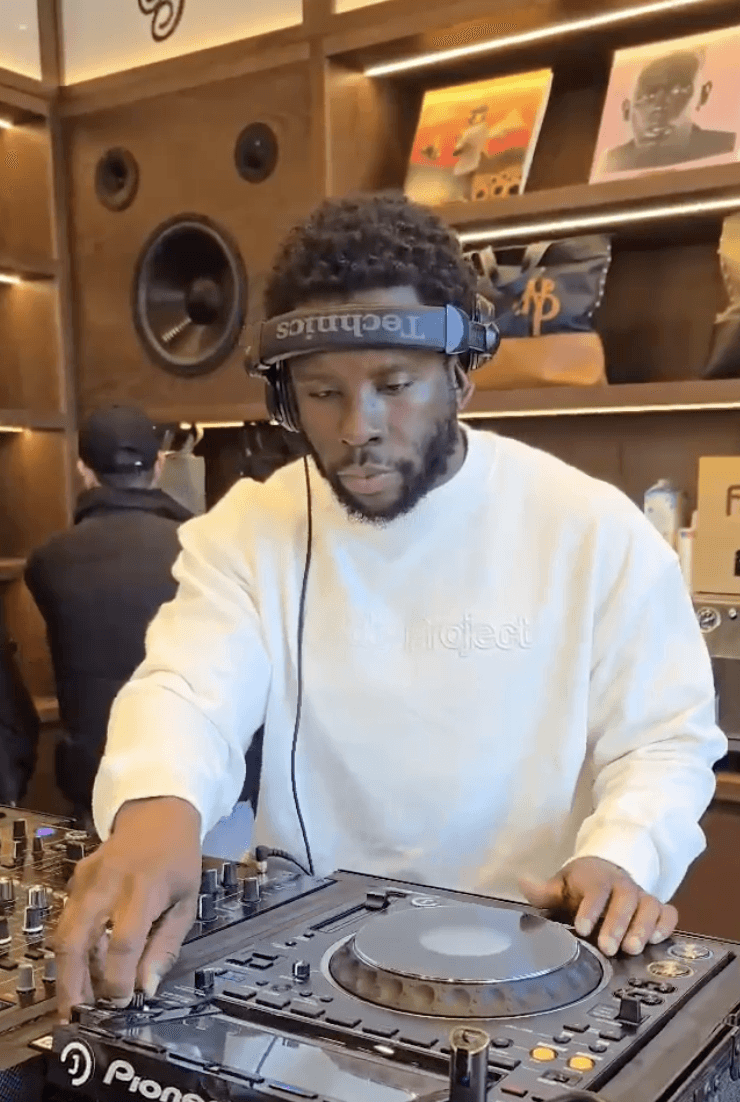 Streetside billboard with flyposters of the Batch.Works brand and illustrations